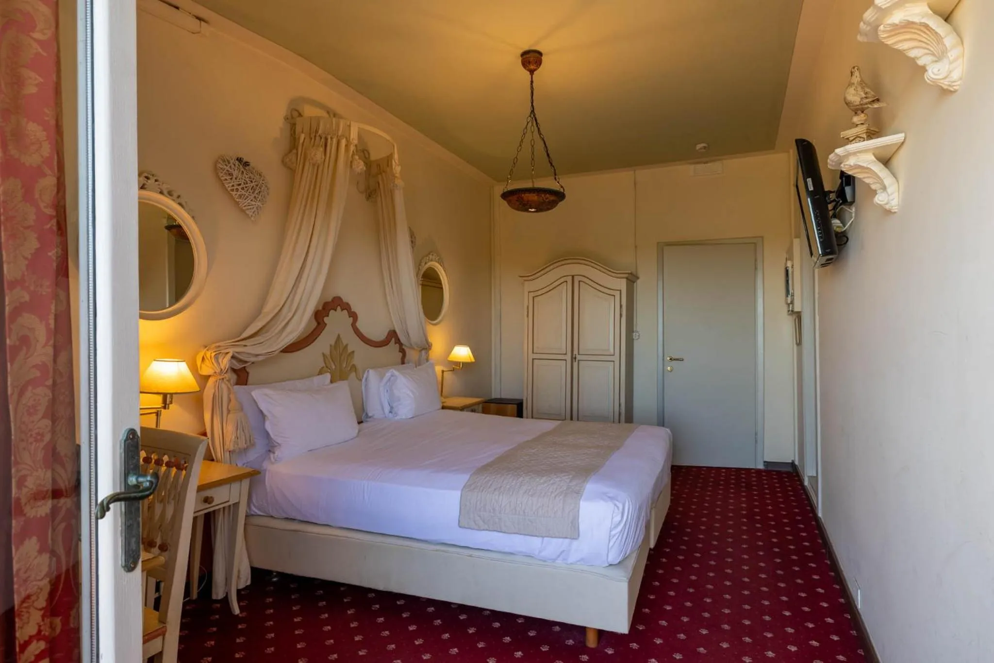 Bed in Quattro Gigli Hotel