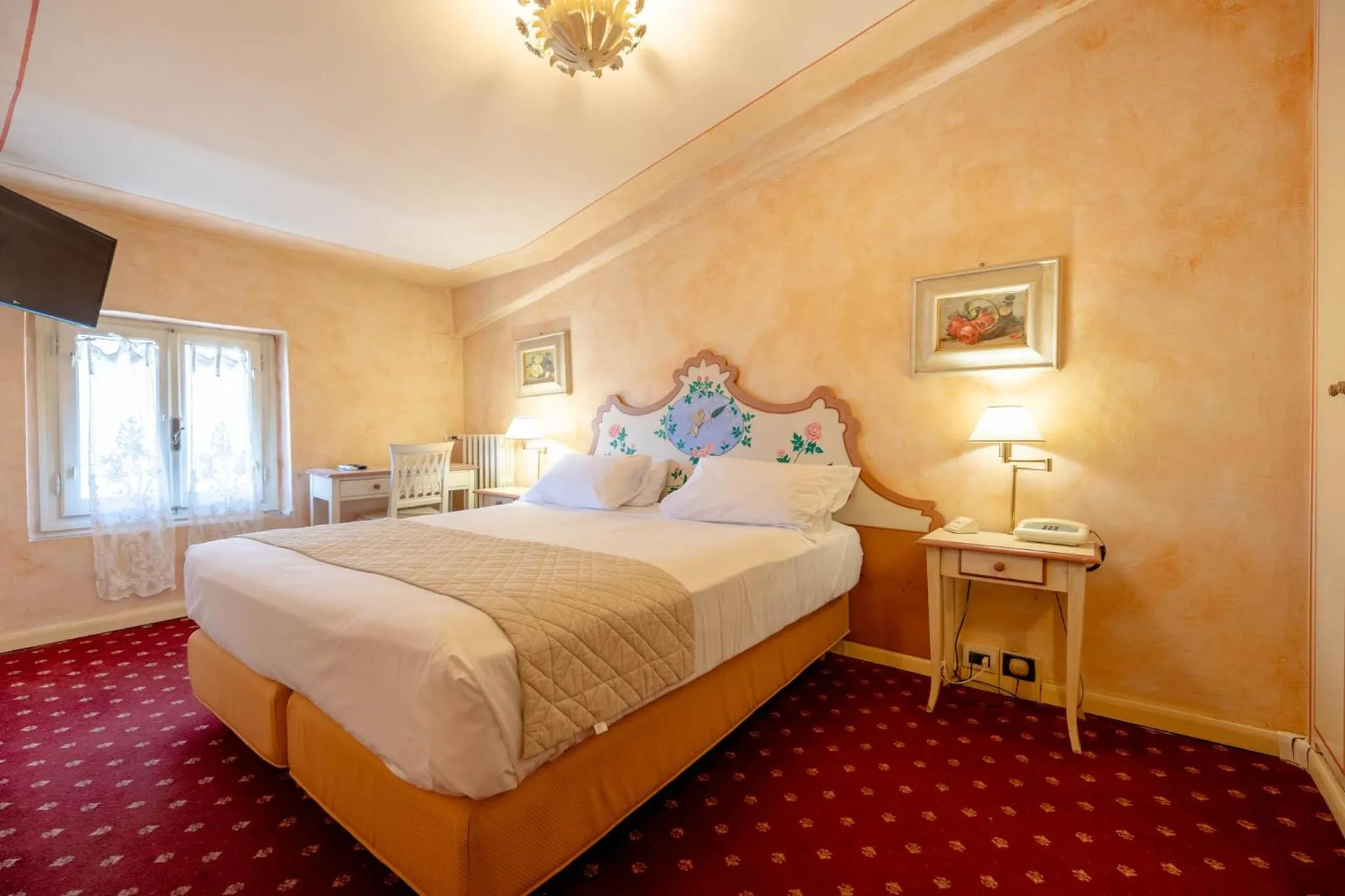 Bed in Quattro Gigli Hotel