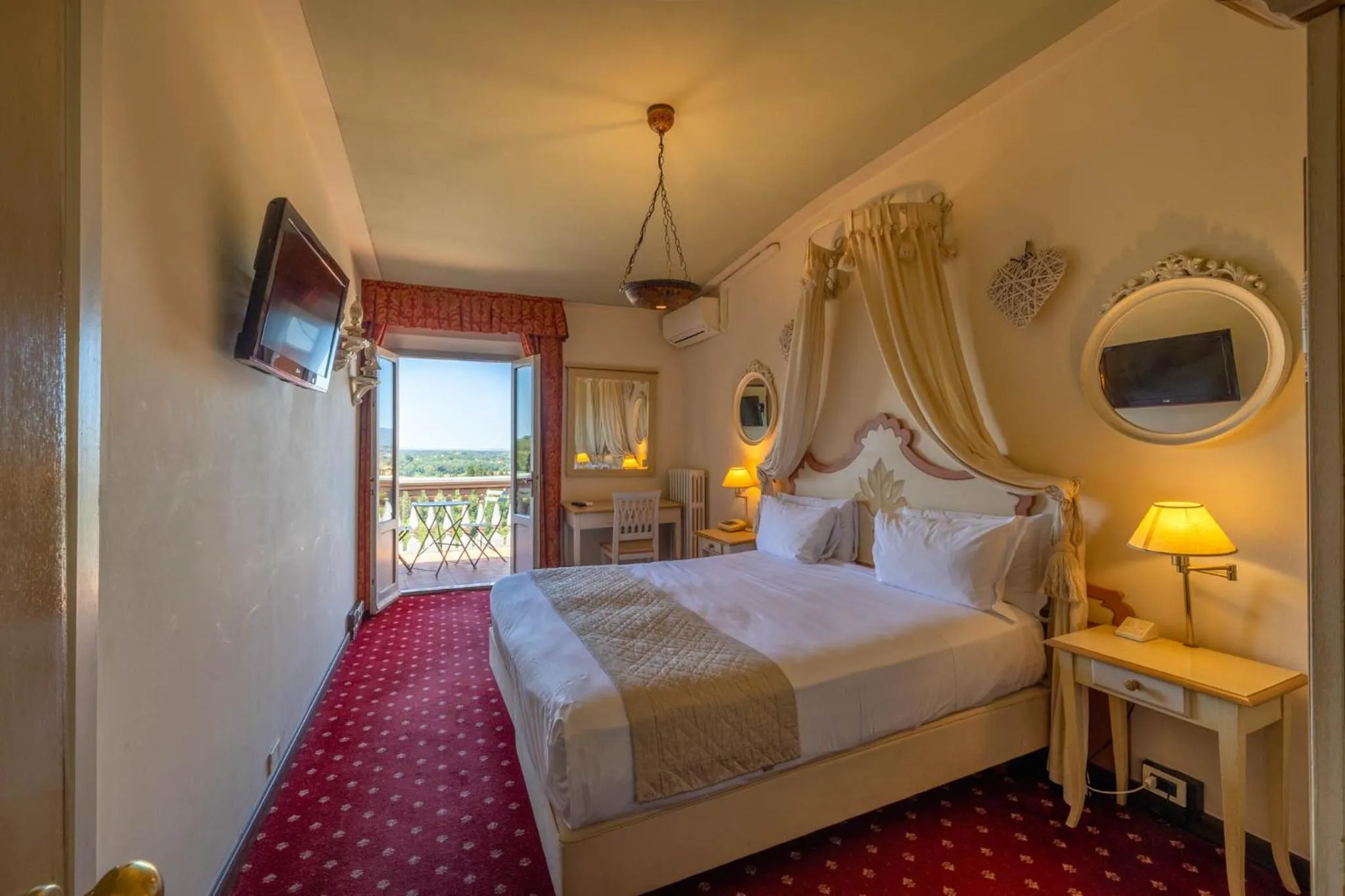 Bed in Quattro Gigli Hotel