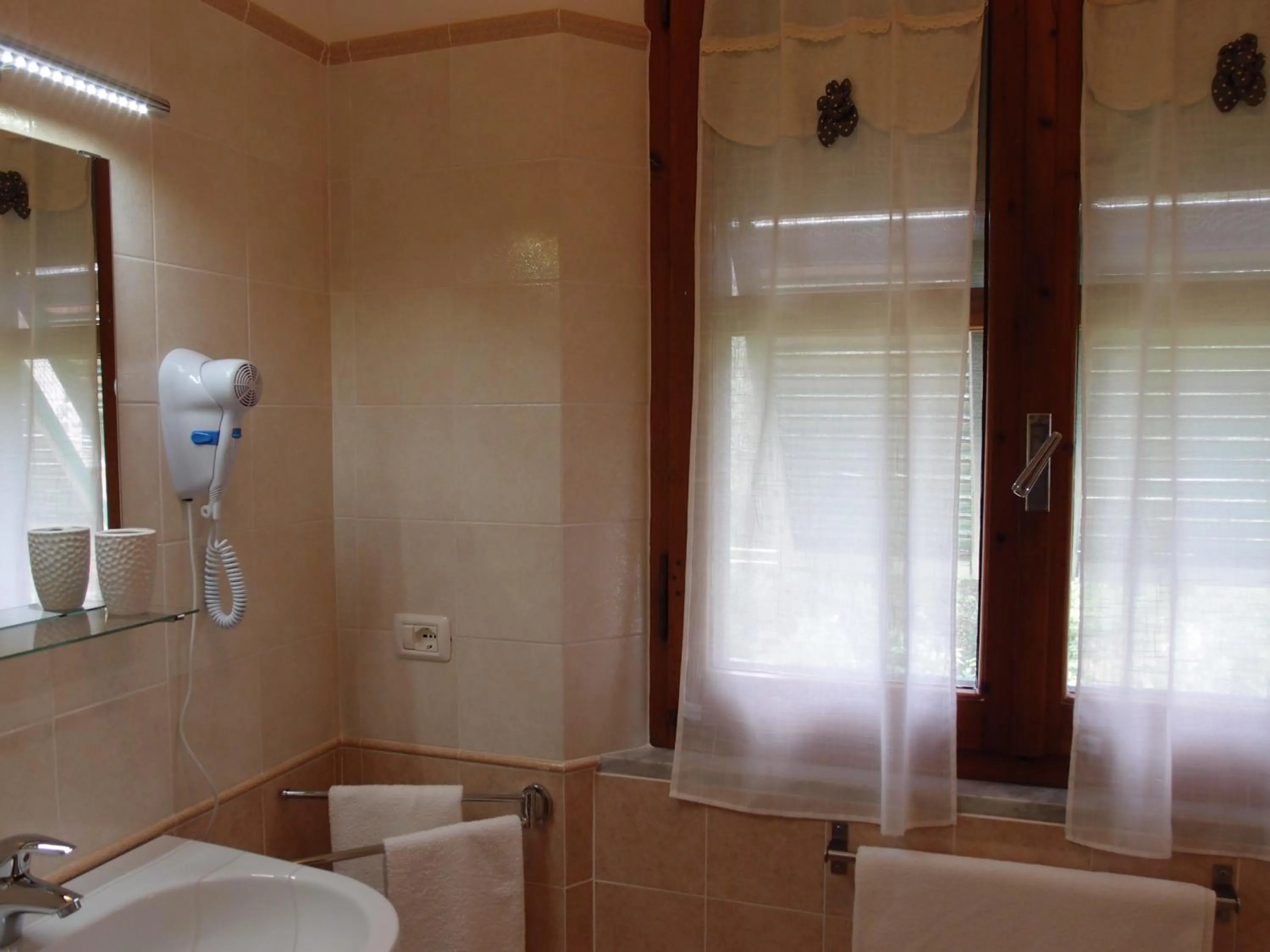 Bathroom in Lo Zizzolo- Bed&Breakfast