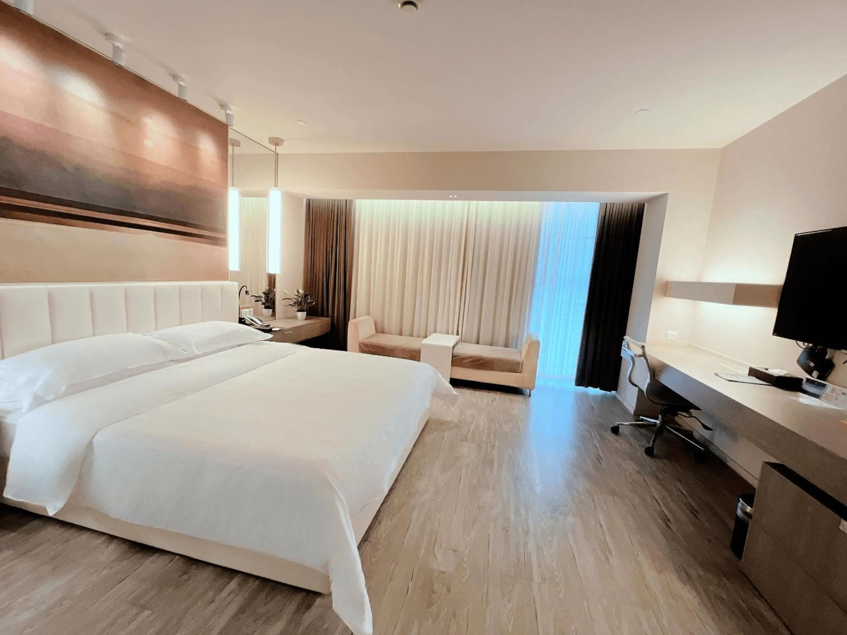 Bed in Jinjiang Metropolo Hotel Hangzhou East Railway Station