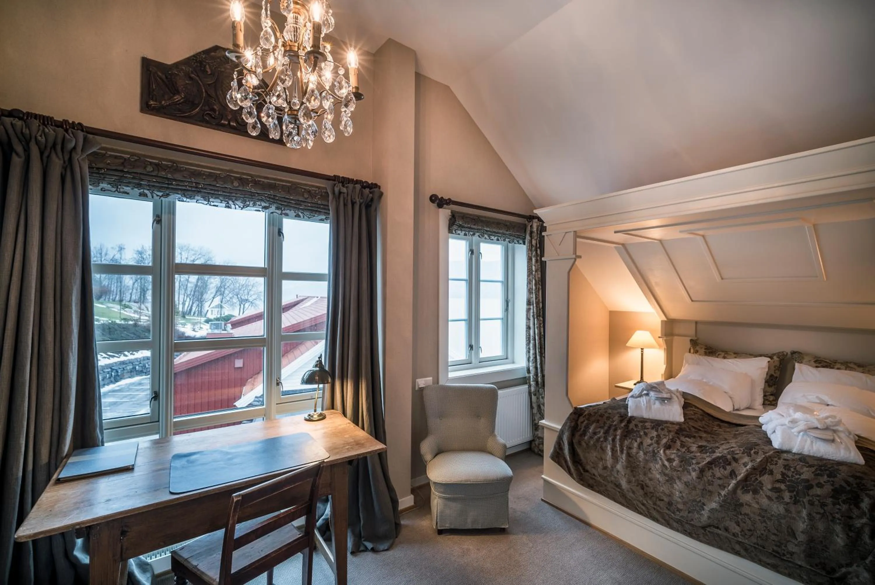 Photo of the whole room, Bed in Angvik Gamle Handelssted - by Classic Norway Hotels