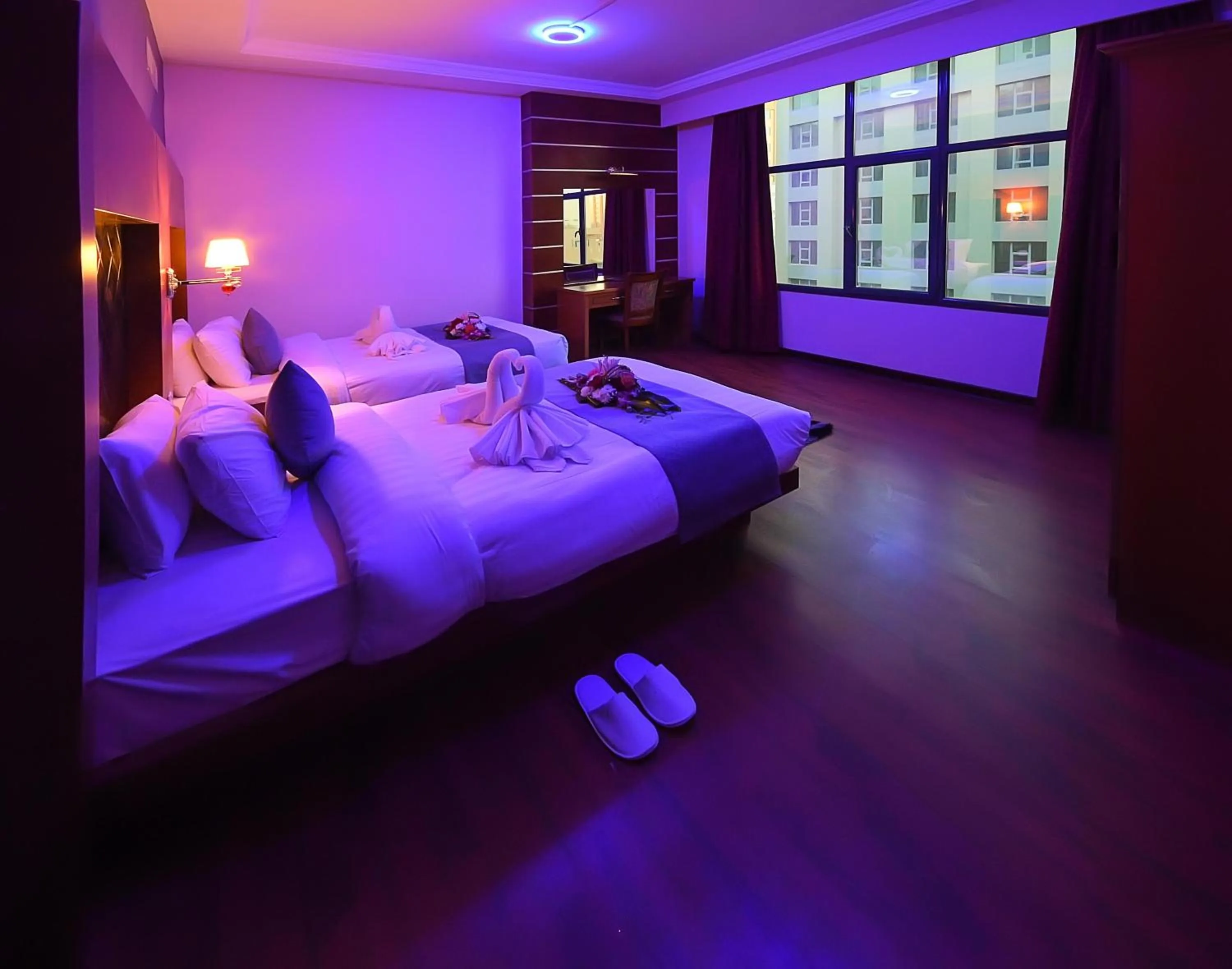 Bed in Sea Diamond Plaza Apartments