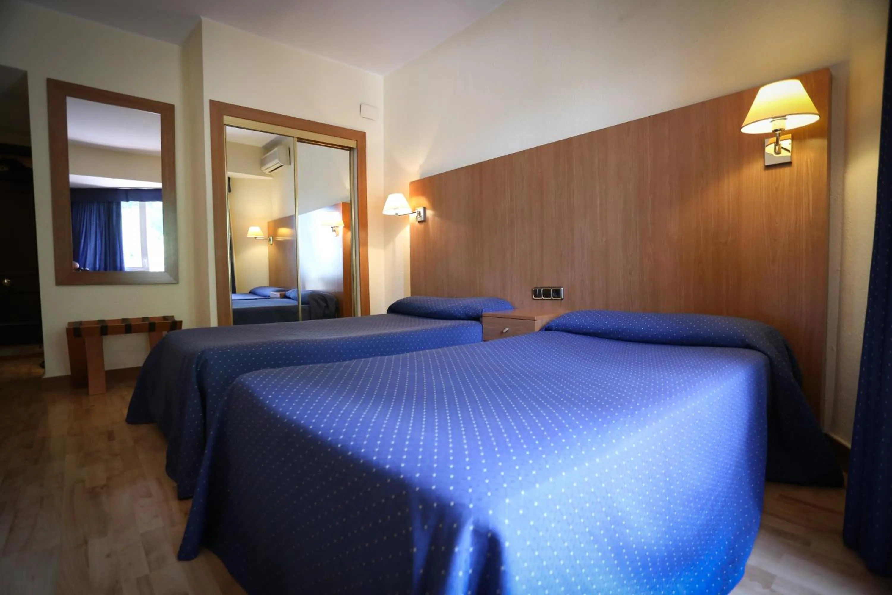 Bed in Hotel El Cisne