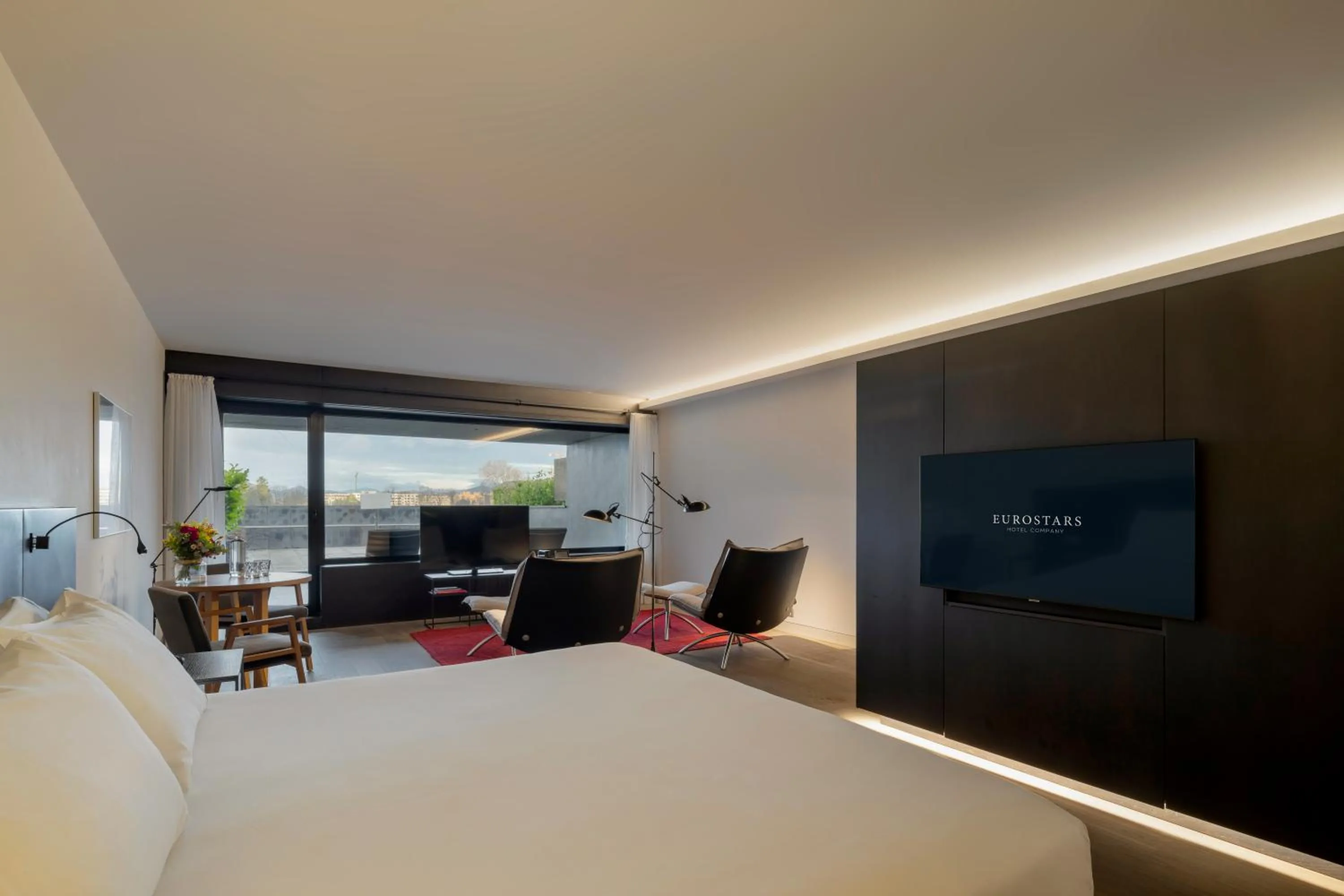 Photo of the whole room, Bed in Eurostars Pamplona