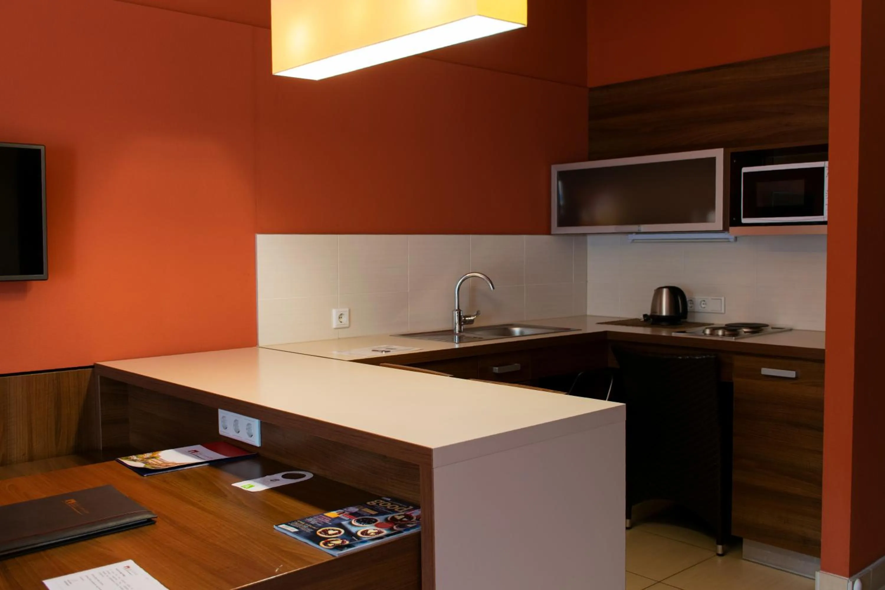 Kitchen or kitchenette in Royal Club Hotel