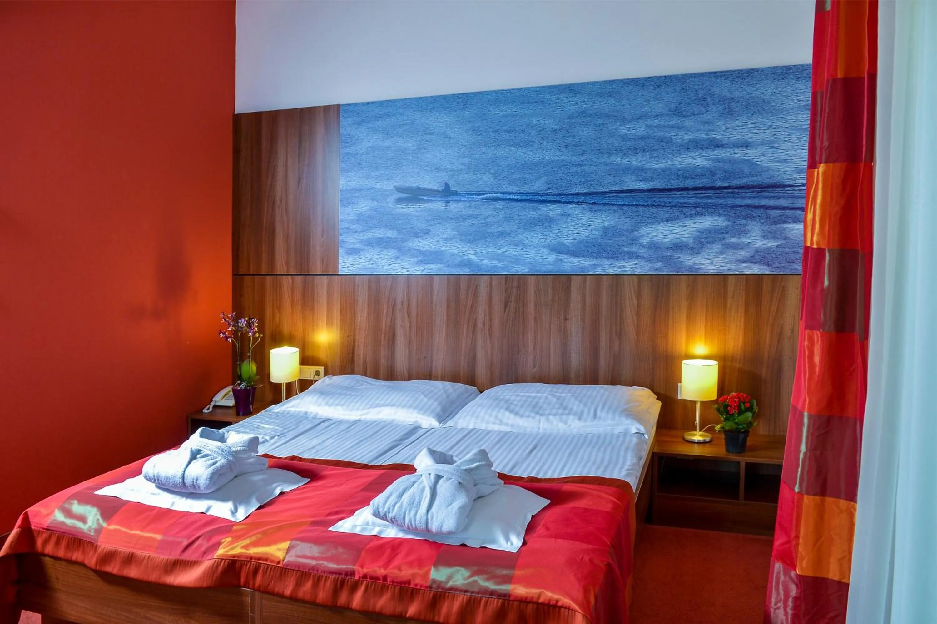 Bed in Royal Club Hotel