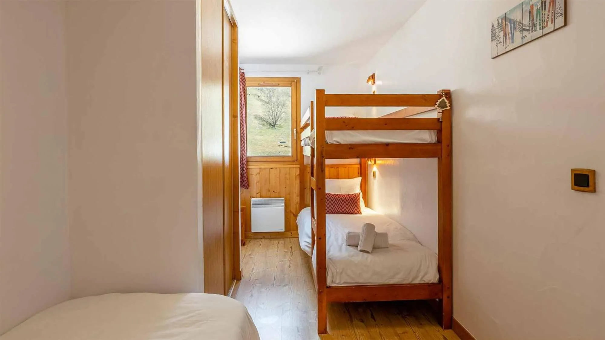 Bed in Madame Vacances Résidence Les Jardins de la Vanoise