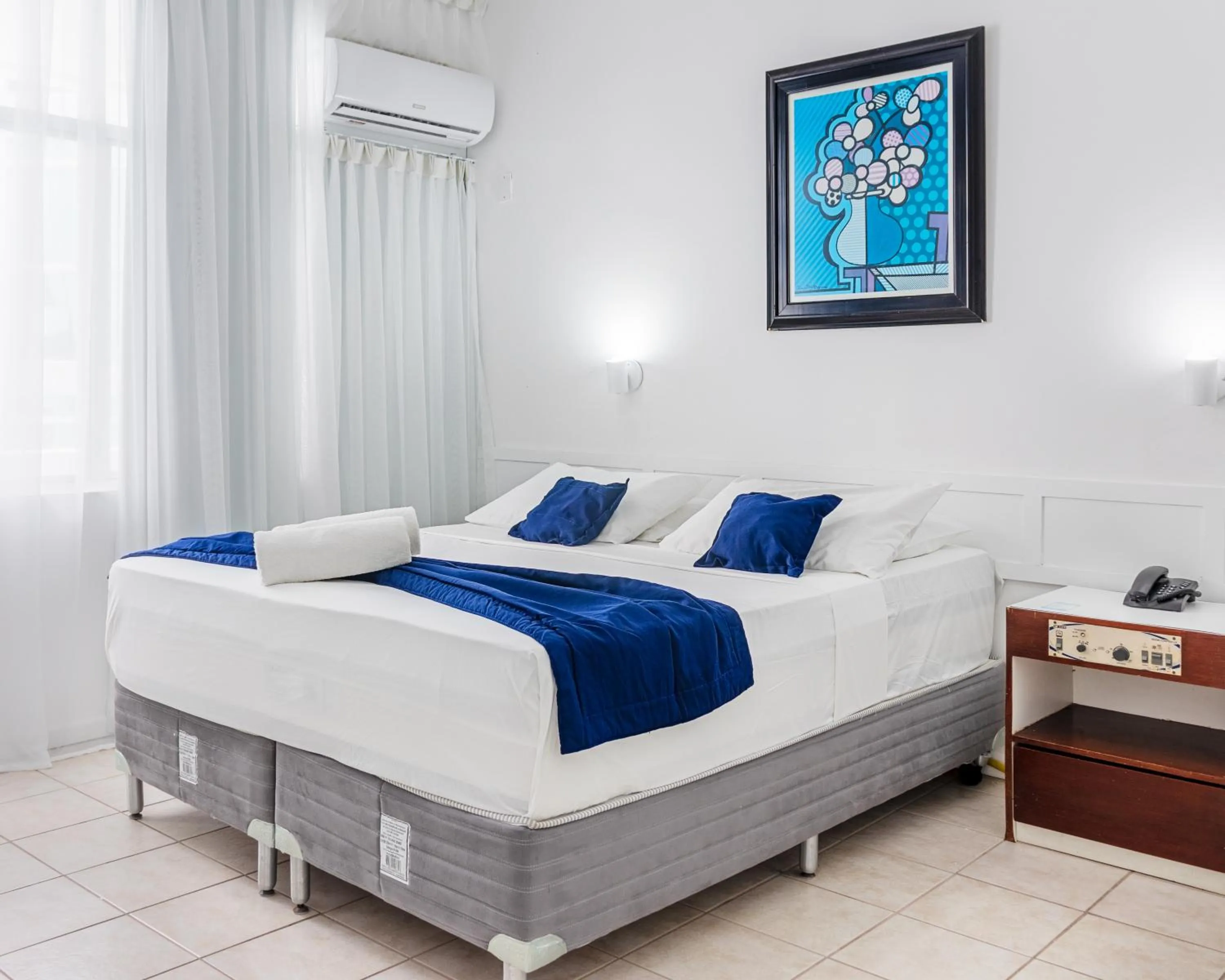 Property building, Bed in Praia Hotel Enseada