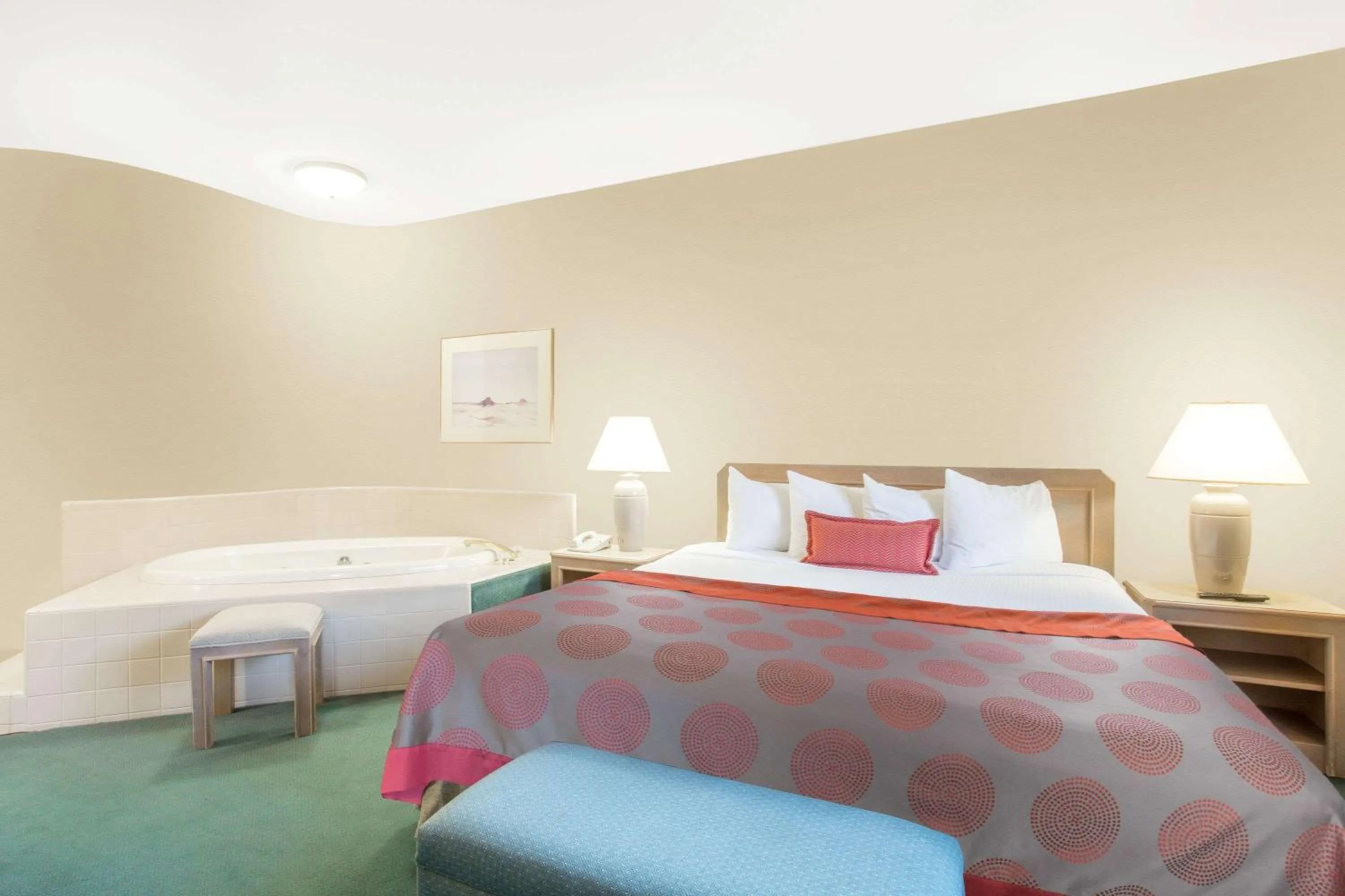 Photo of the whole room, Bed in Ramada by Wyndham St George