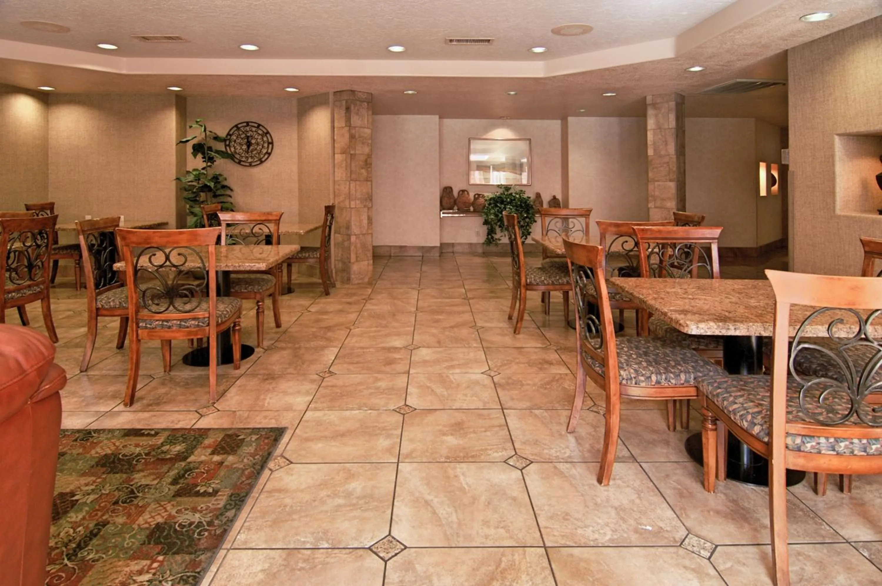 Communal lounge/ TV room in Ramada by Wyndham St George