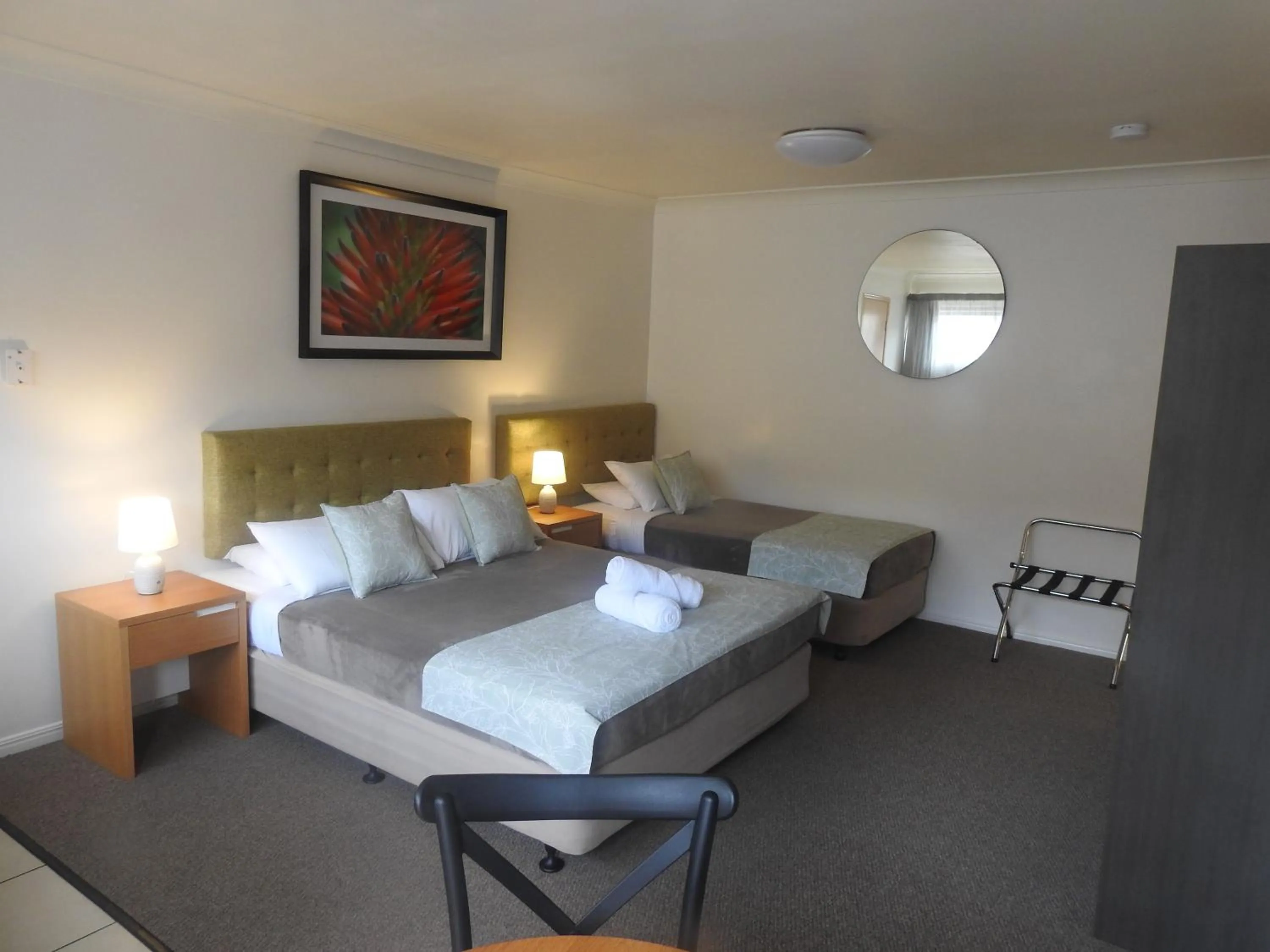 Bed in Cedar Lodge Motel