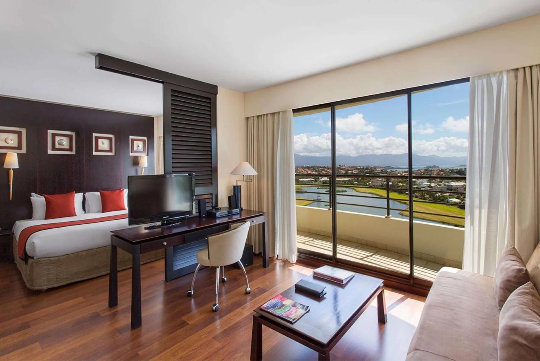 Photo of the whole room, Bed in Ramada Hotel & Suites by Wyndham Noumea