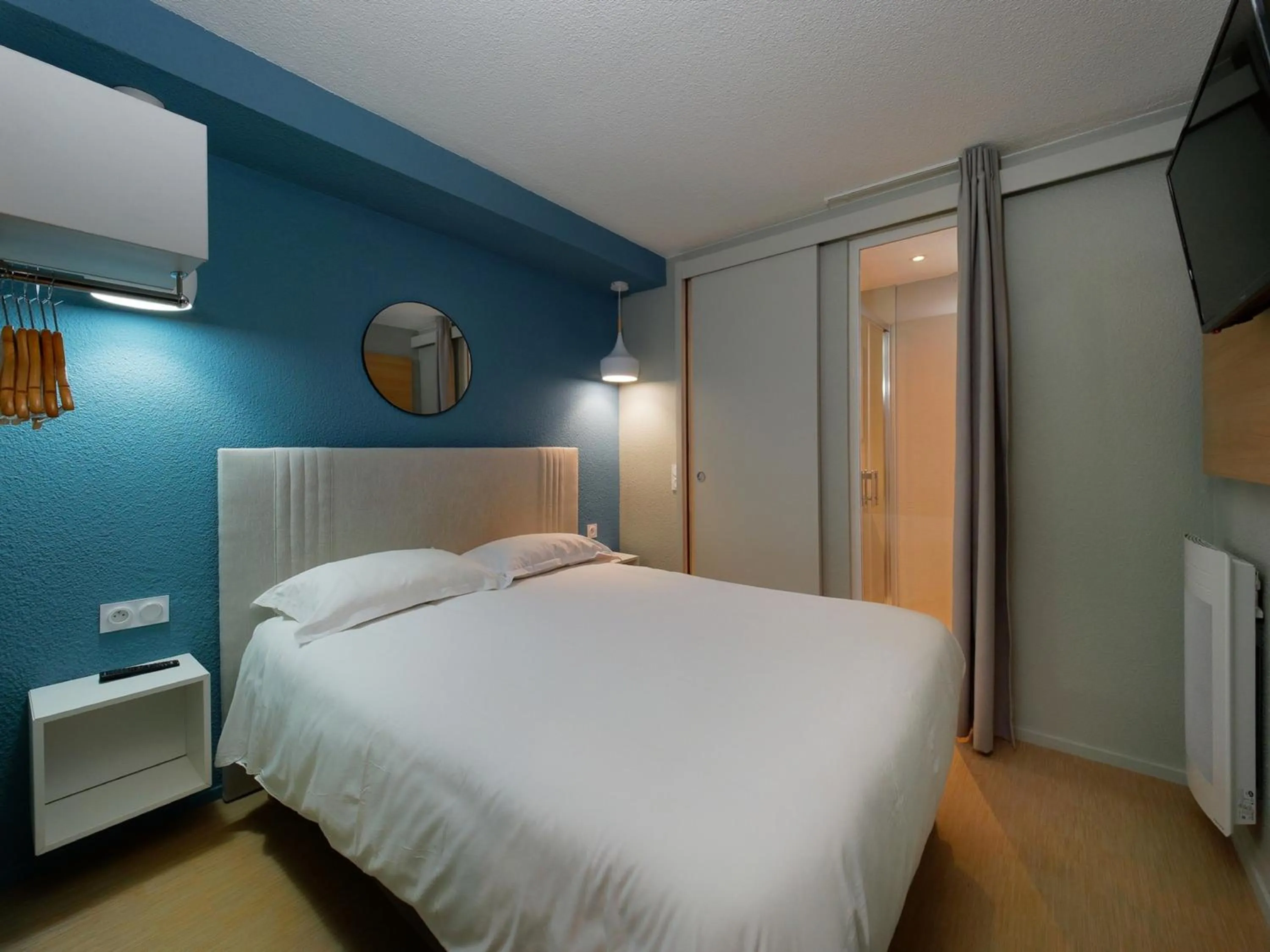 Bed in Kyriad DIRECT Saint Brieuc - Parc des Expositions