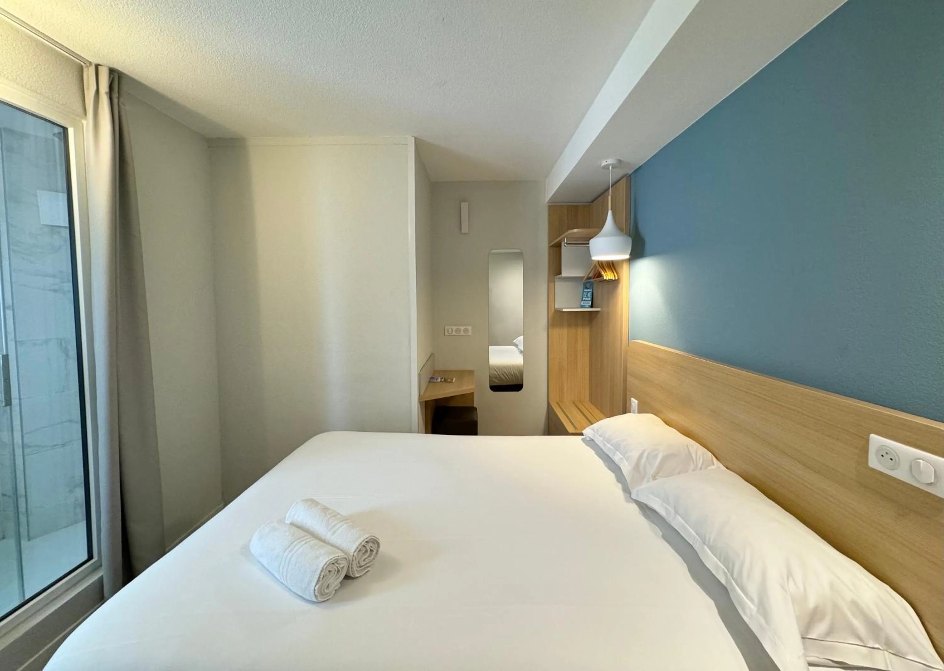 Bed in Kyriad DIRECT Saint Brieuc - Parc des Expositions