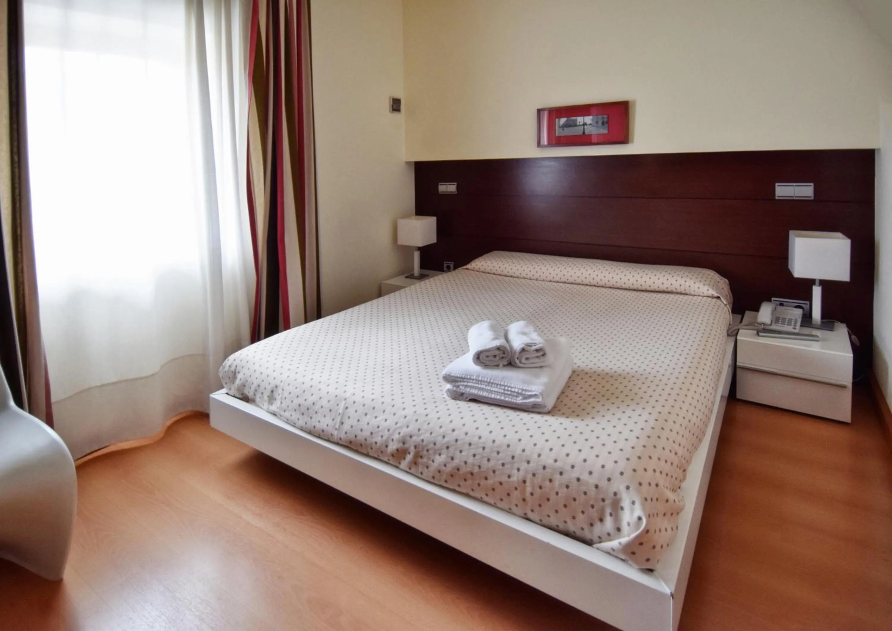 Bedroom, Bed in Apartamentos María Luisa