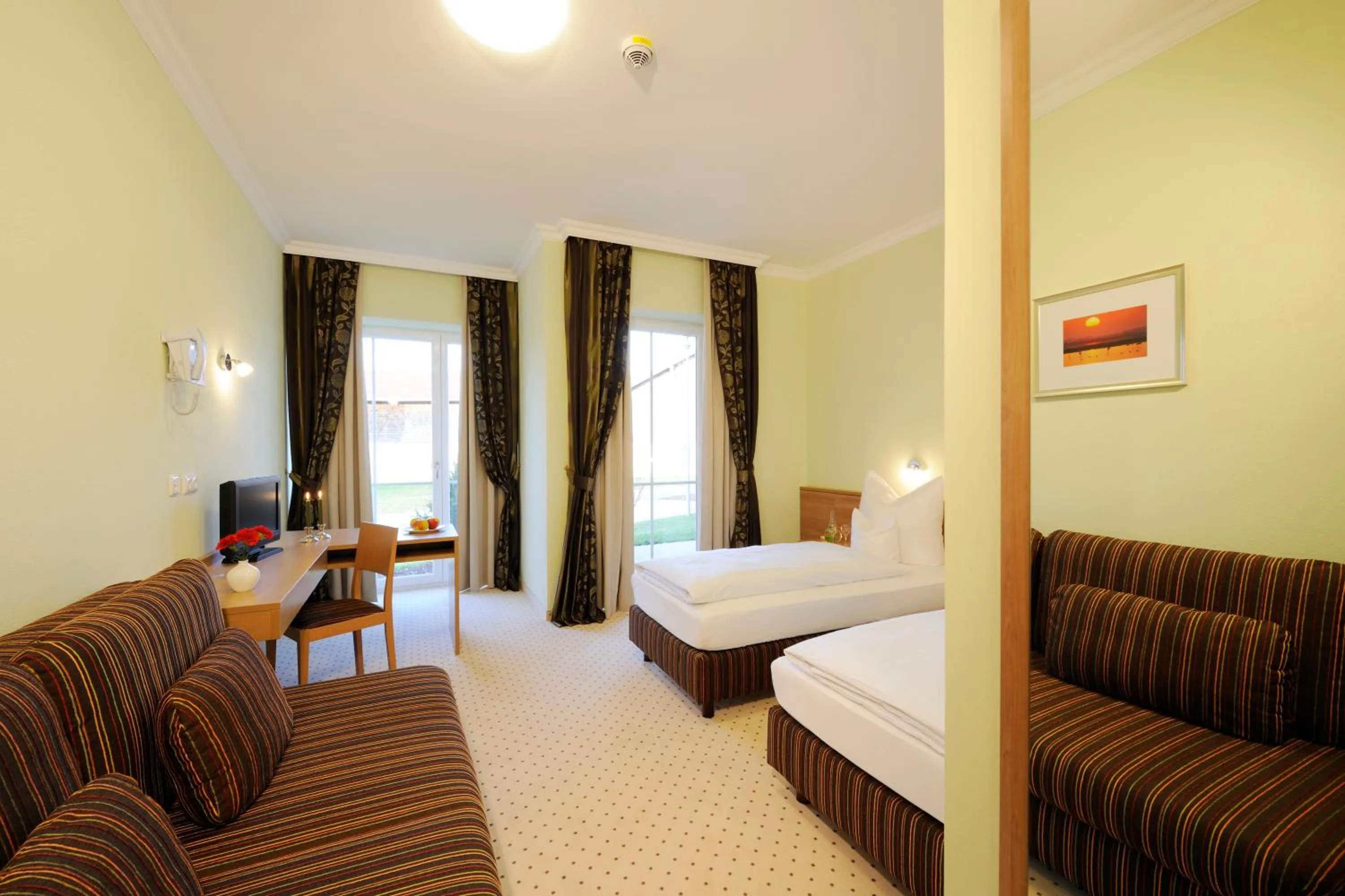 Living room, Bed in Hotel Inspiration Garni