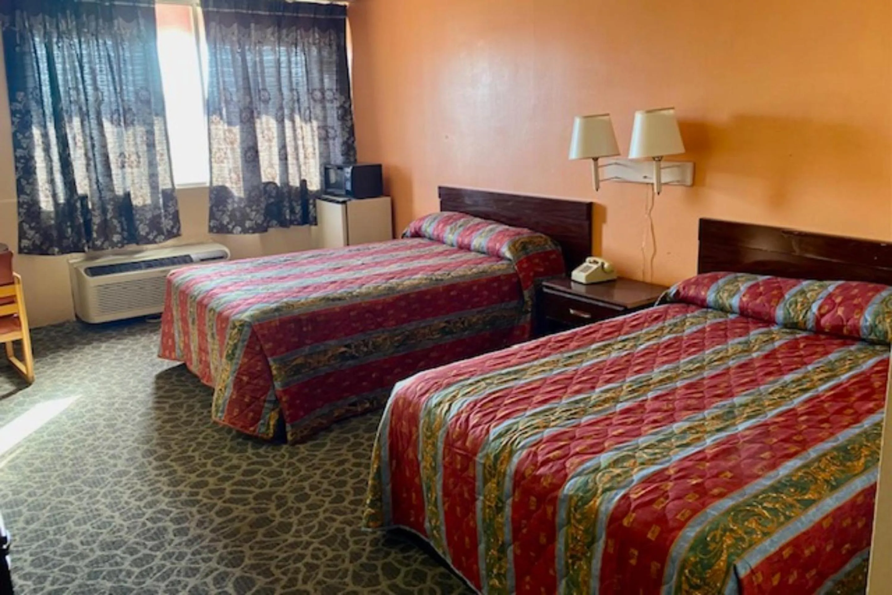 Bedroom, Bed in Red Carpet Inn & Suites Lima -Listing Partner