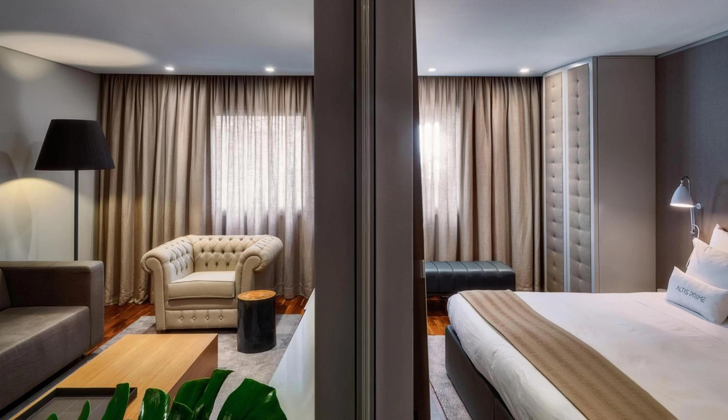 Living room, Bed in Altis Prime Hotel