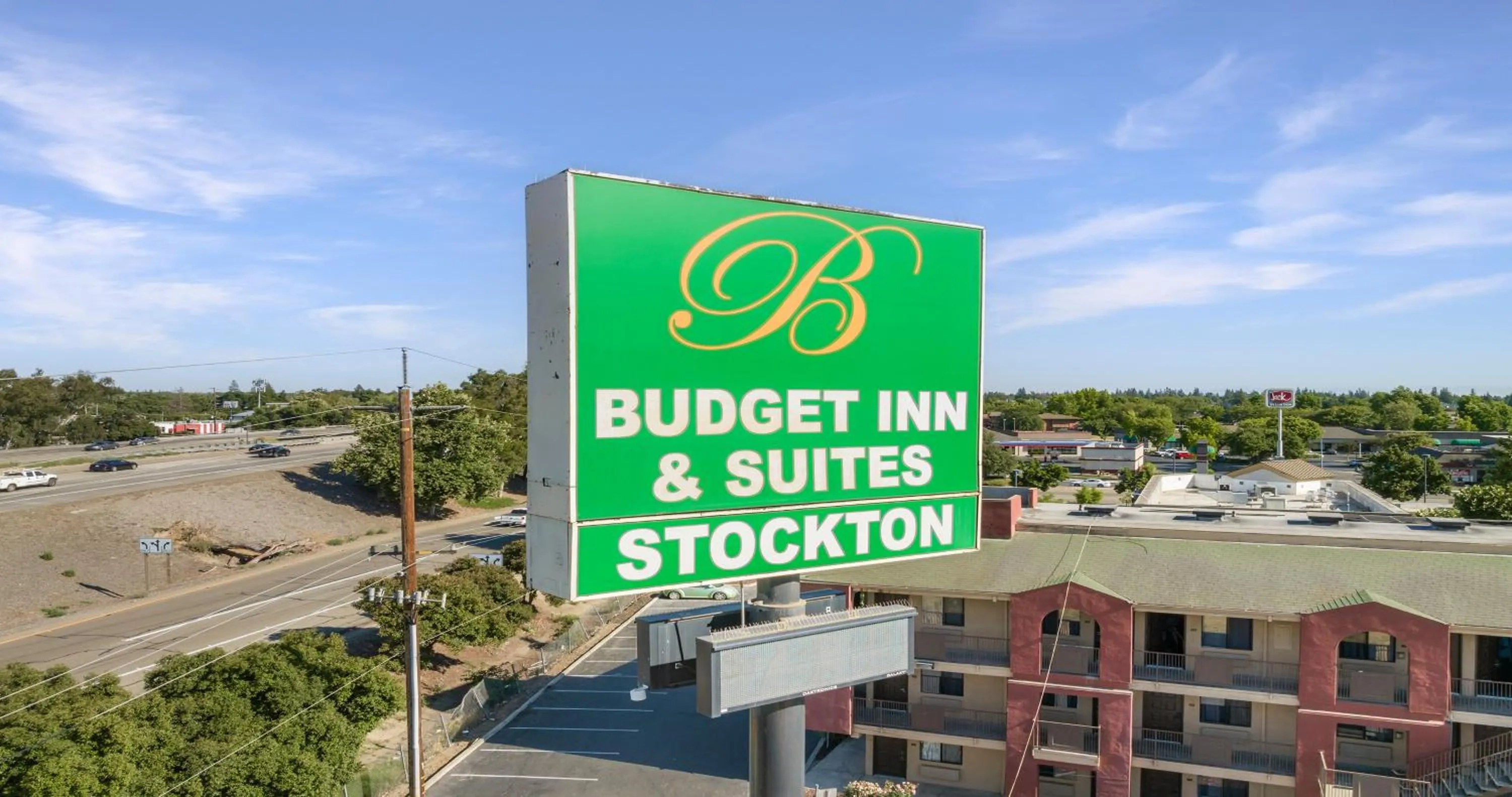 Property logo or sign in Budget Inn and Suites Stockton Yosemite