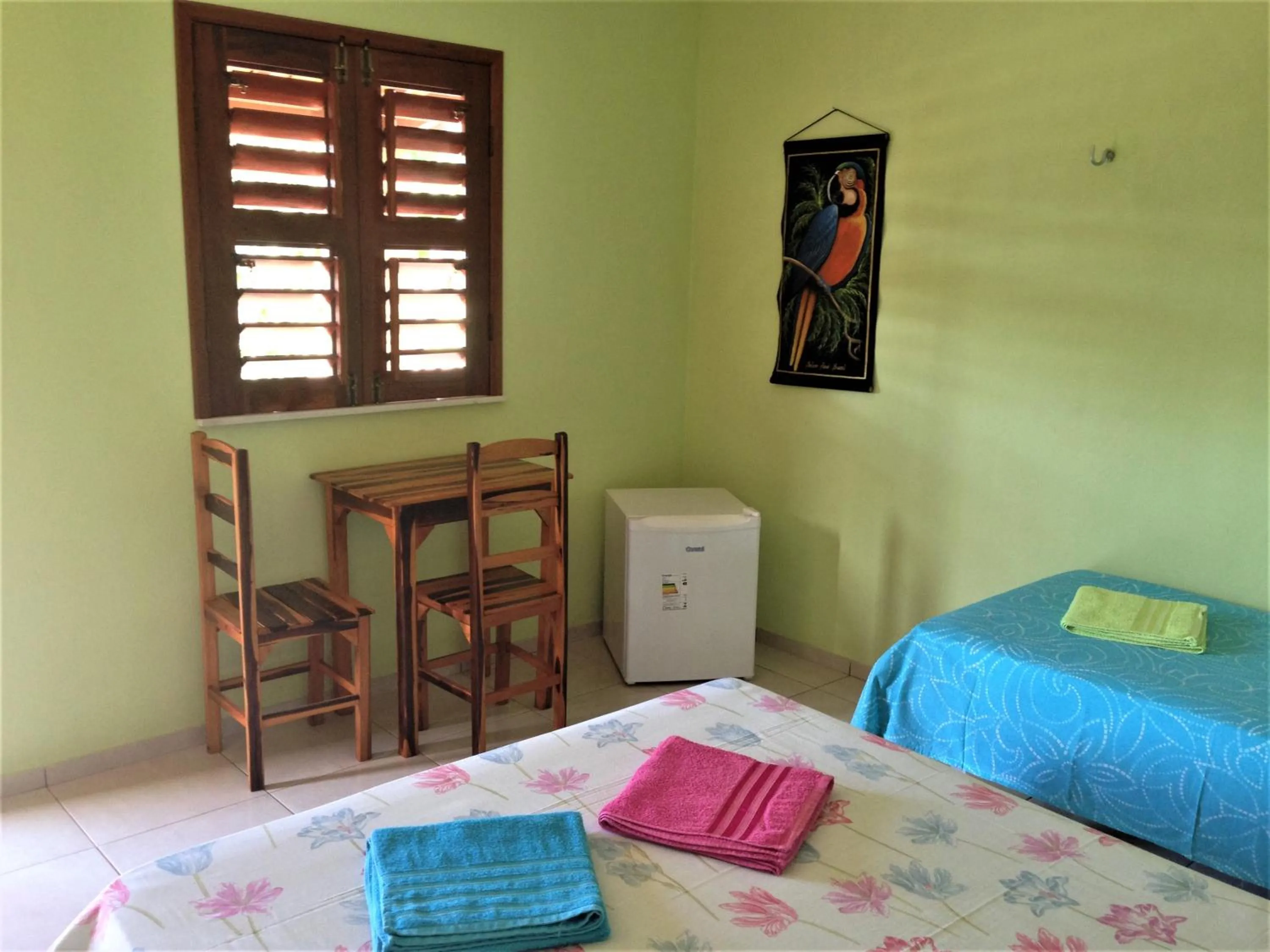 Bed in Pousada Muiraquitã