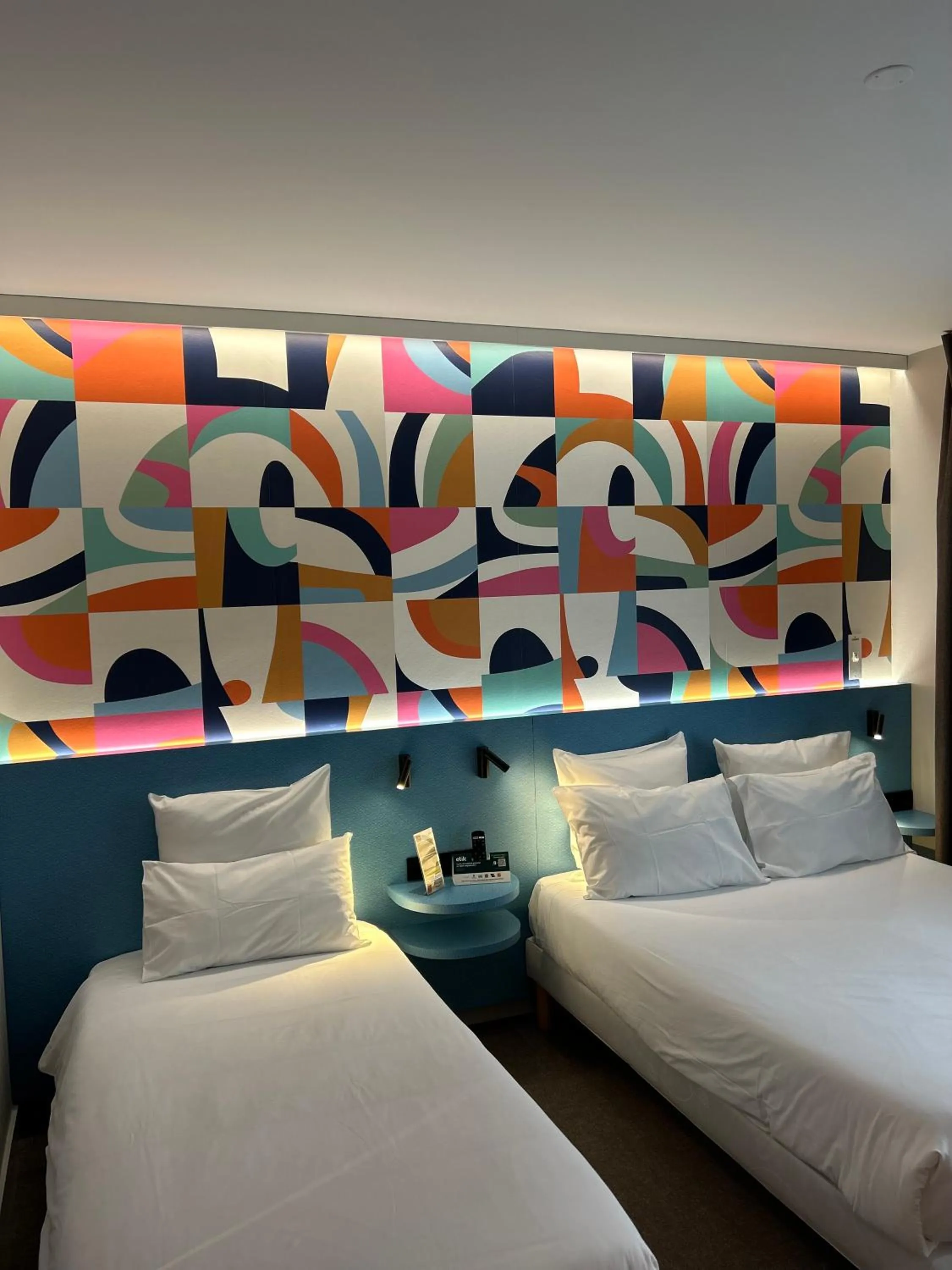 Bed in Cit'Hotel L'Etape