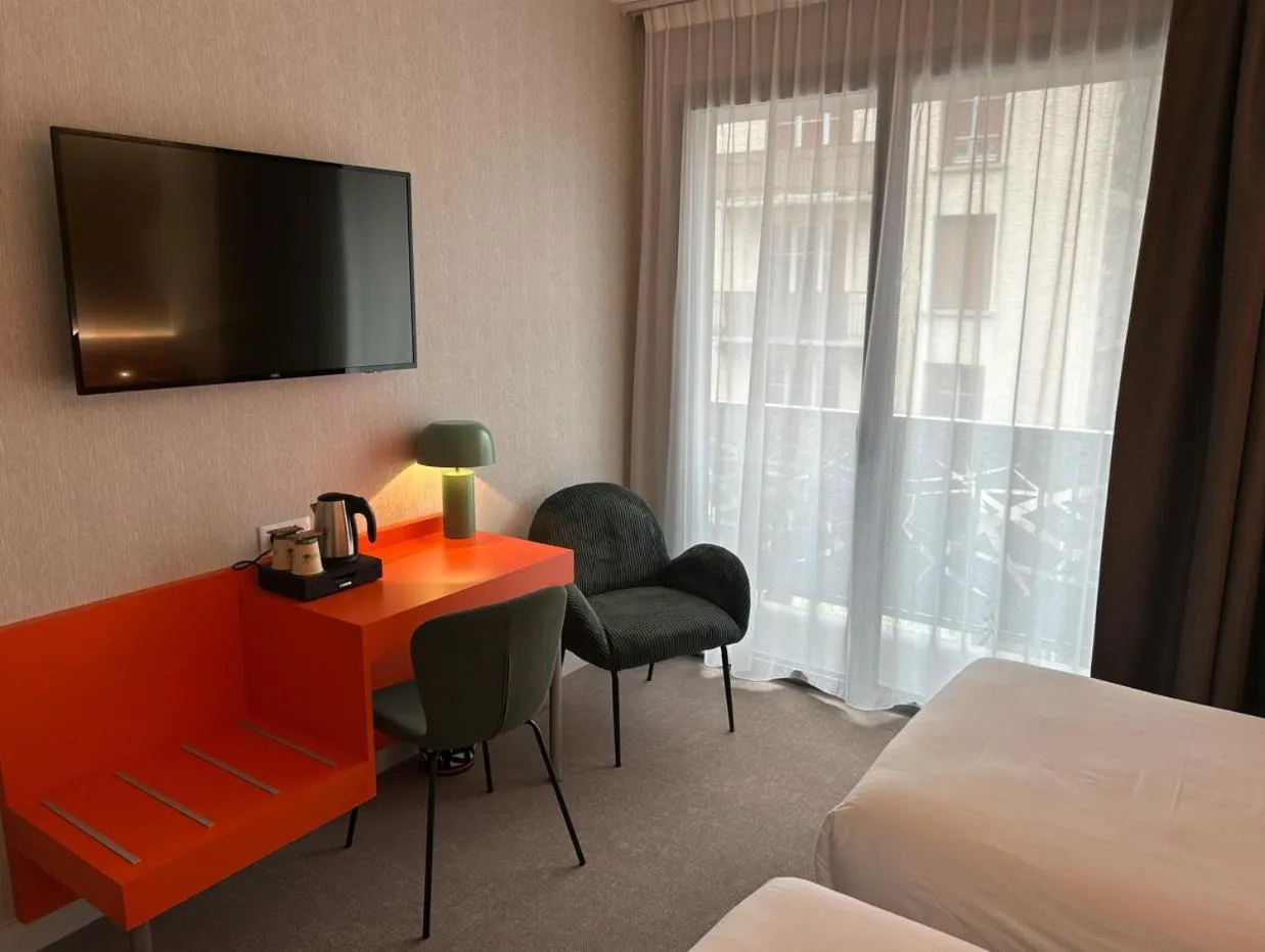 Bed in Cit'Hotel L'Etape