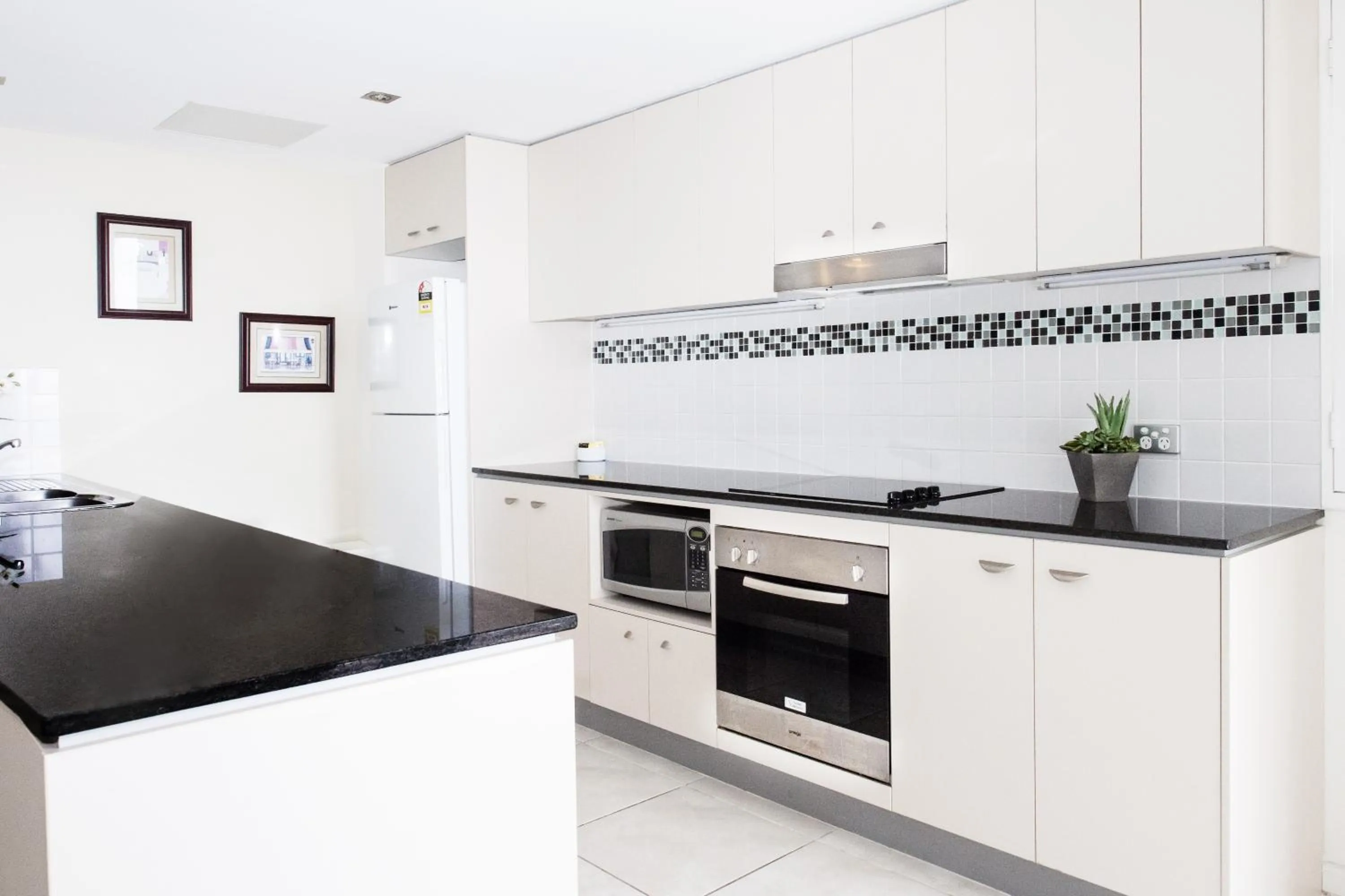 Kitchen or kitchenette in Ocean Views Resort Caloundra