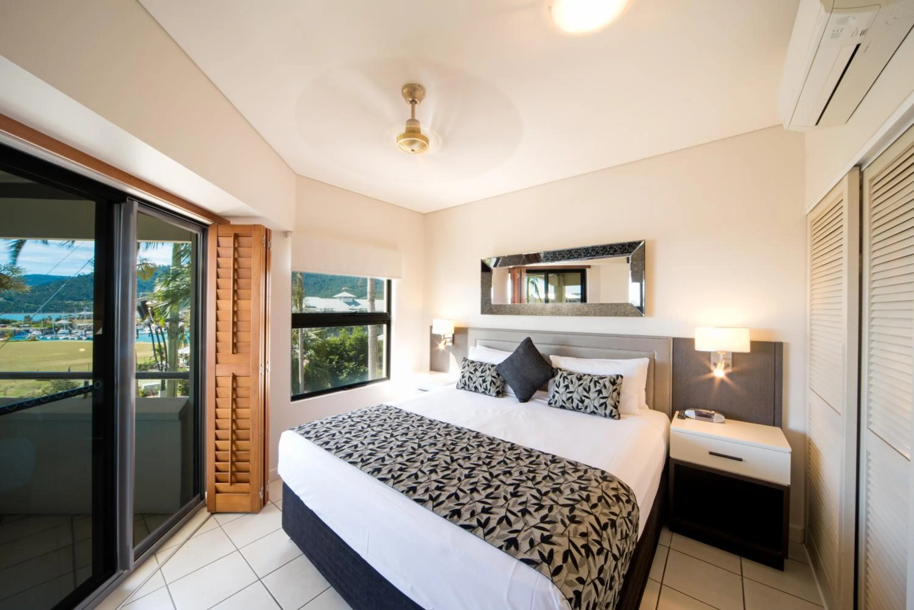 Bedroom, Bed in Portside Whitsunday Luxury Holiday Apartments