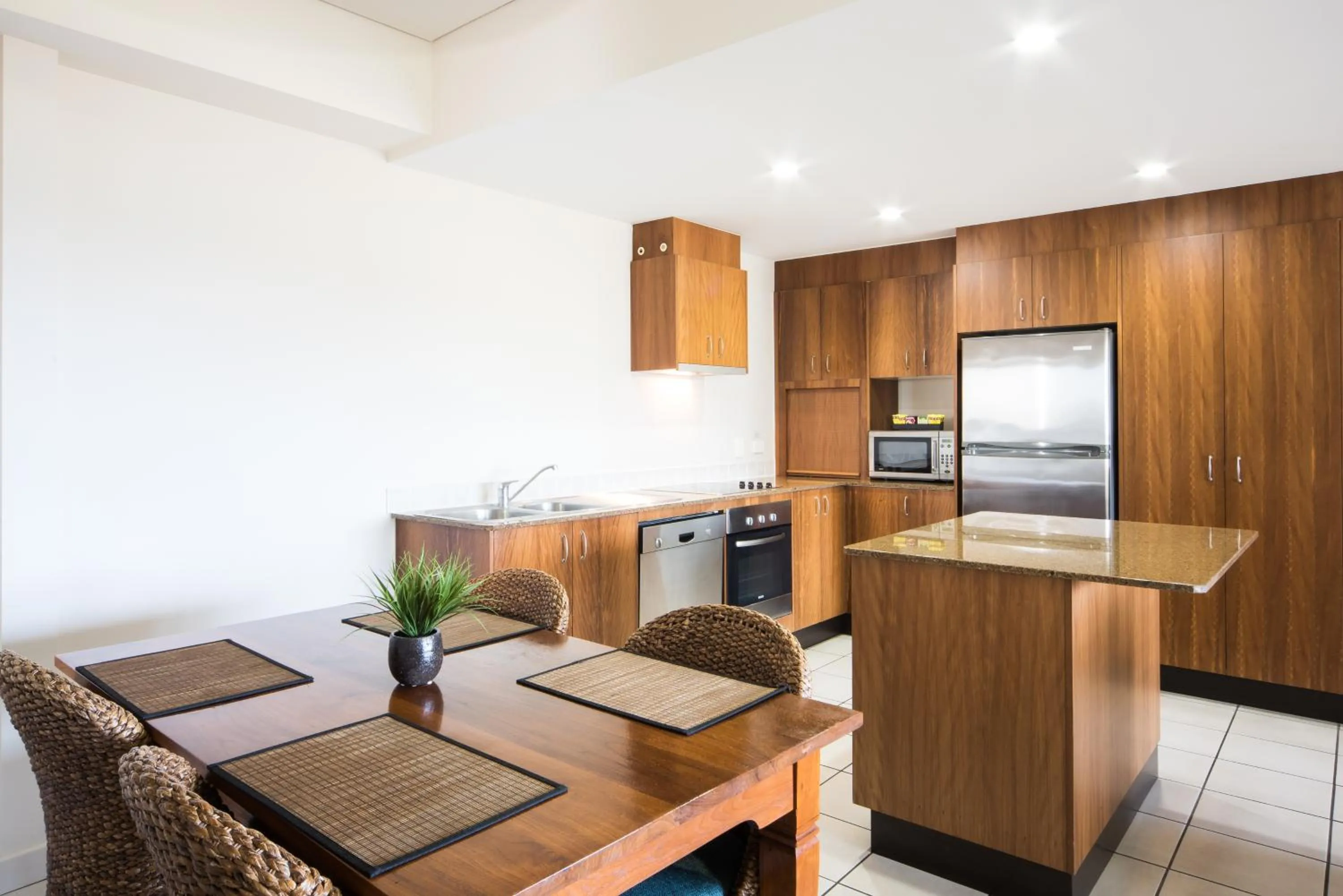 Kitchen or kitchenette in Portside Whitsunday Luxury Holiday Apartments
