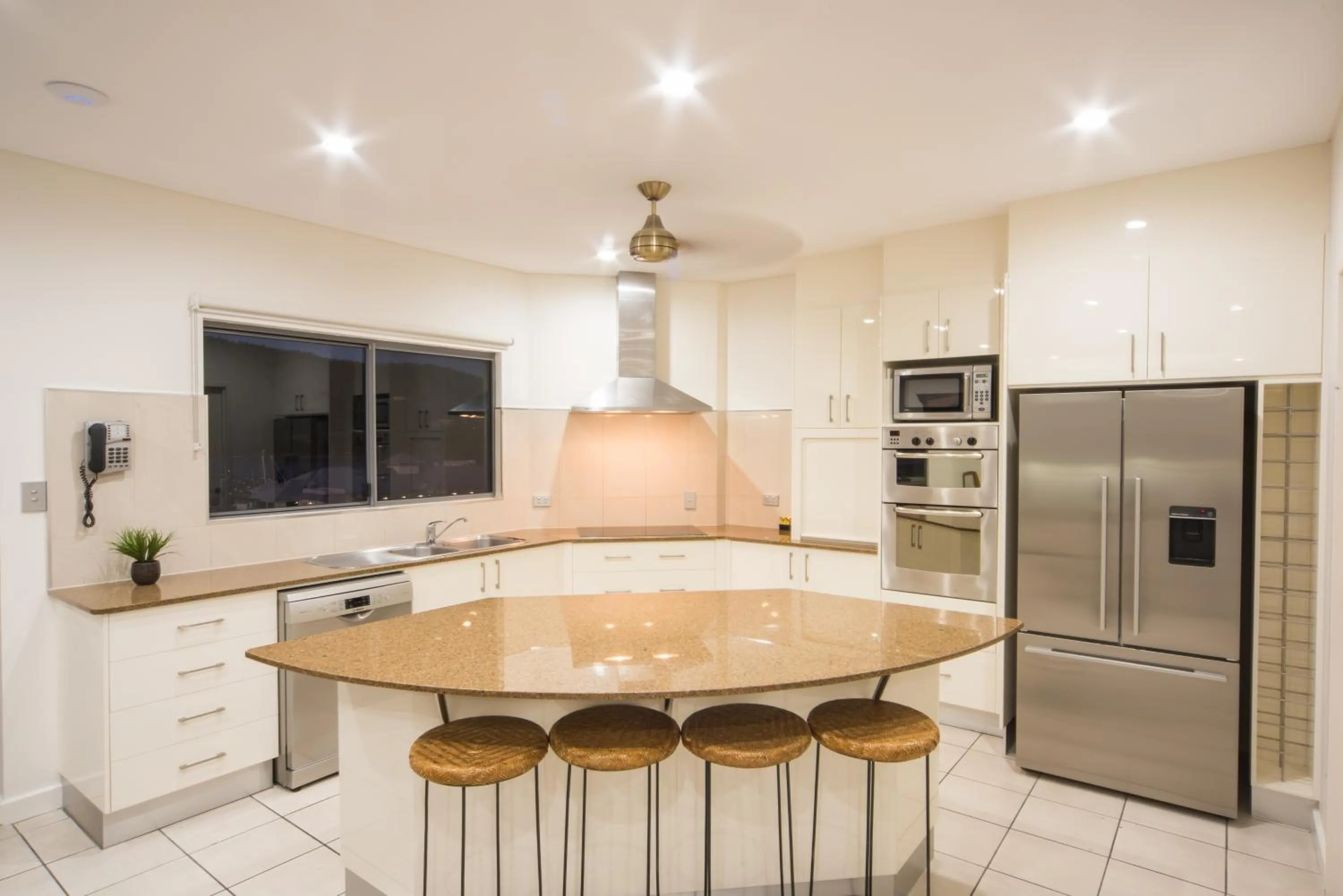 Kitchen or kitchenette in Portside Whitsunday Luxury Holiday Apartments
