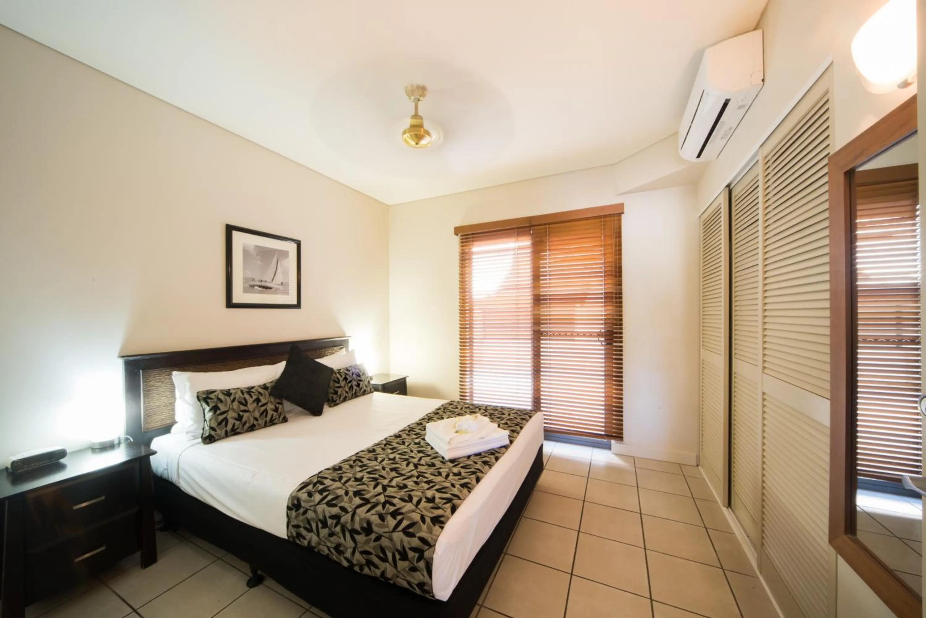 Bed in Portside Whitsunday Luxury Holiday Apartments
