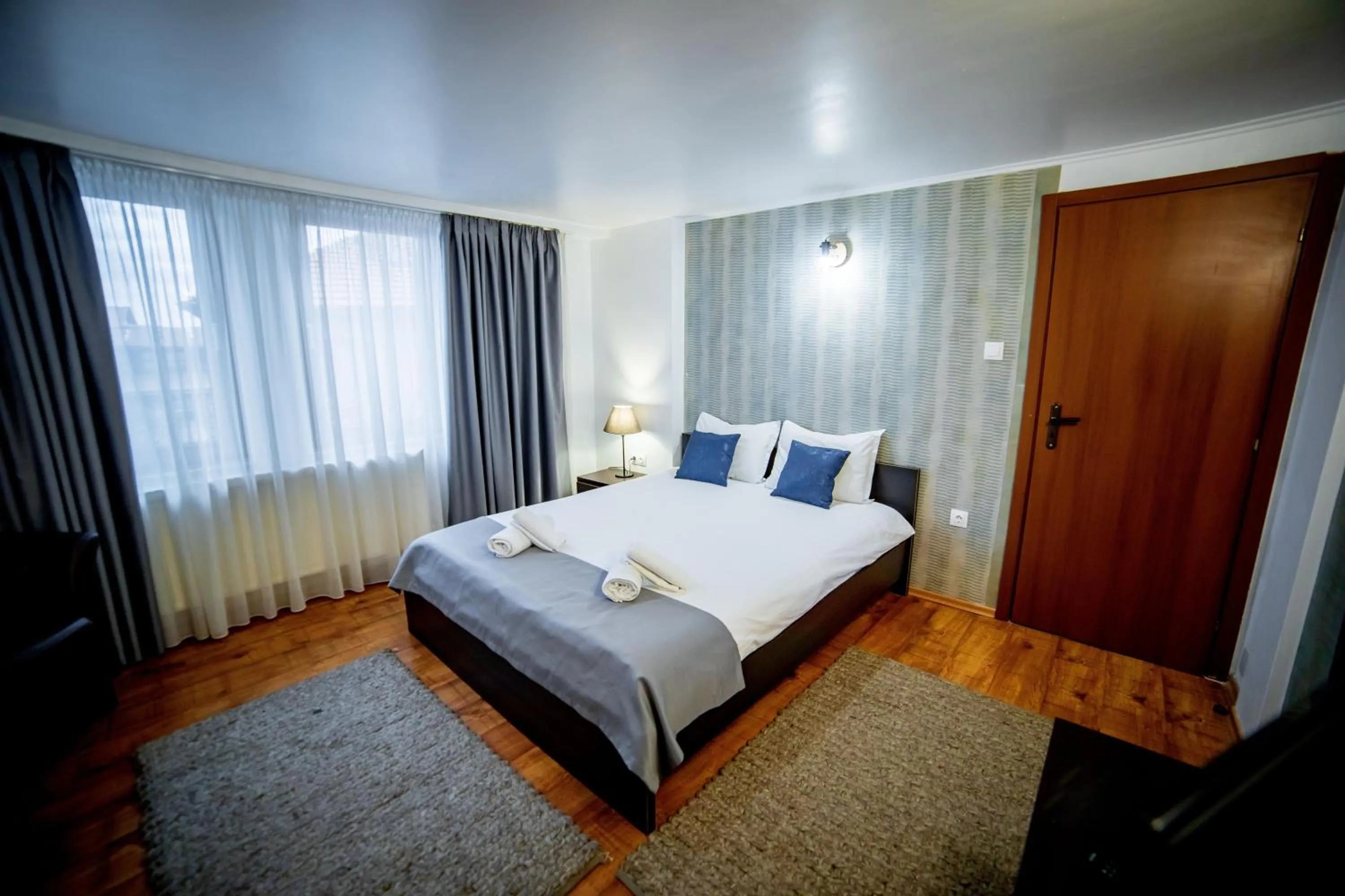 Bed in Velinov Boutique Hotel