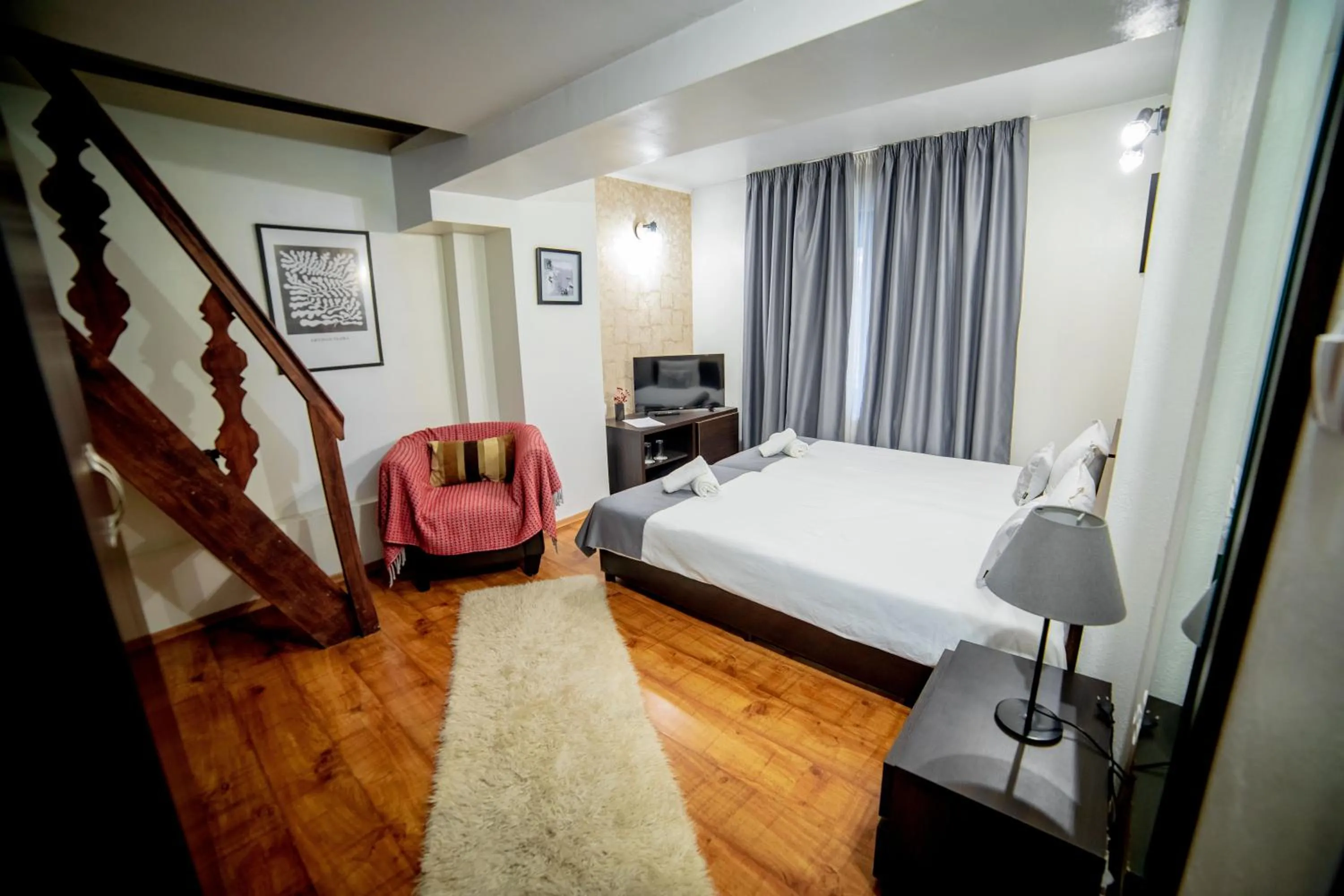 Bed in Velinov Boutique Hotel