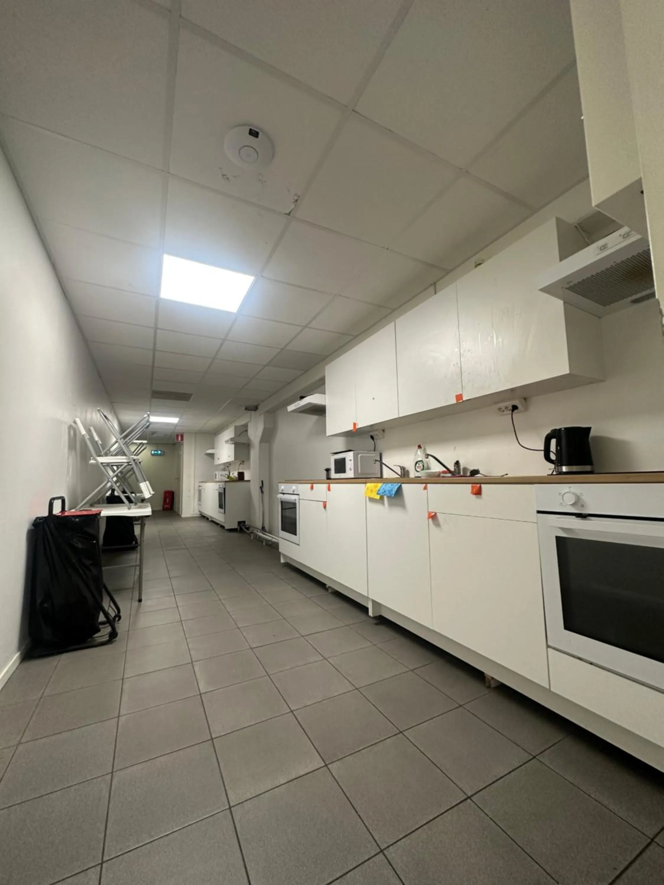 Communal kitchen in Hostel by Bromma