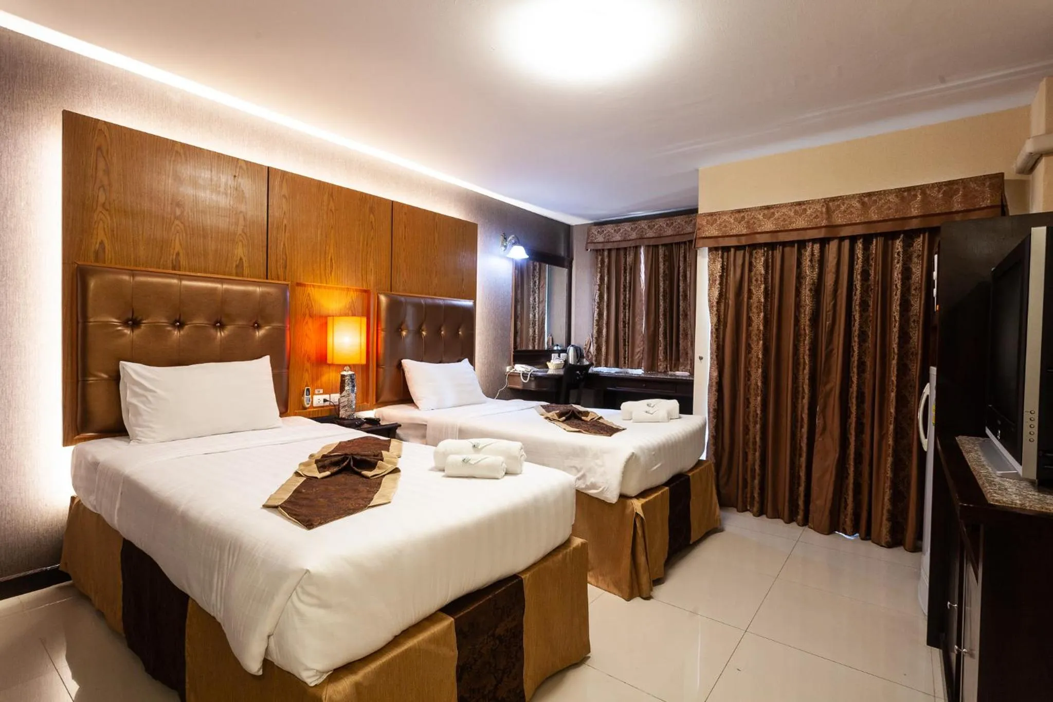 Bed in The Airport Greenery Hotel