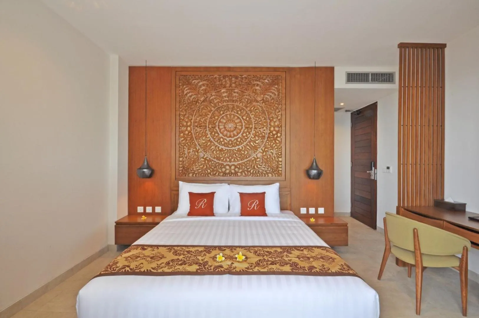 Bed in Rajavilla Lombok Resort - Seaside Serenity