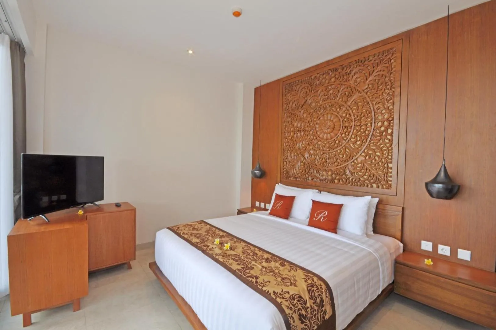 Bed in Rajavilla Lombok Resort - Seaside Serenity