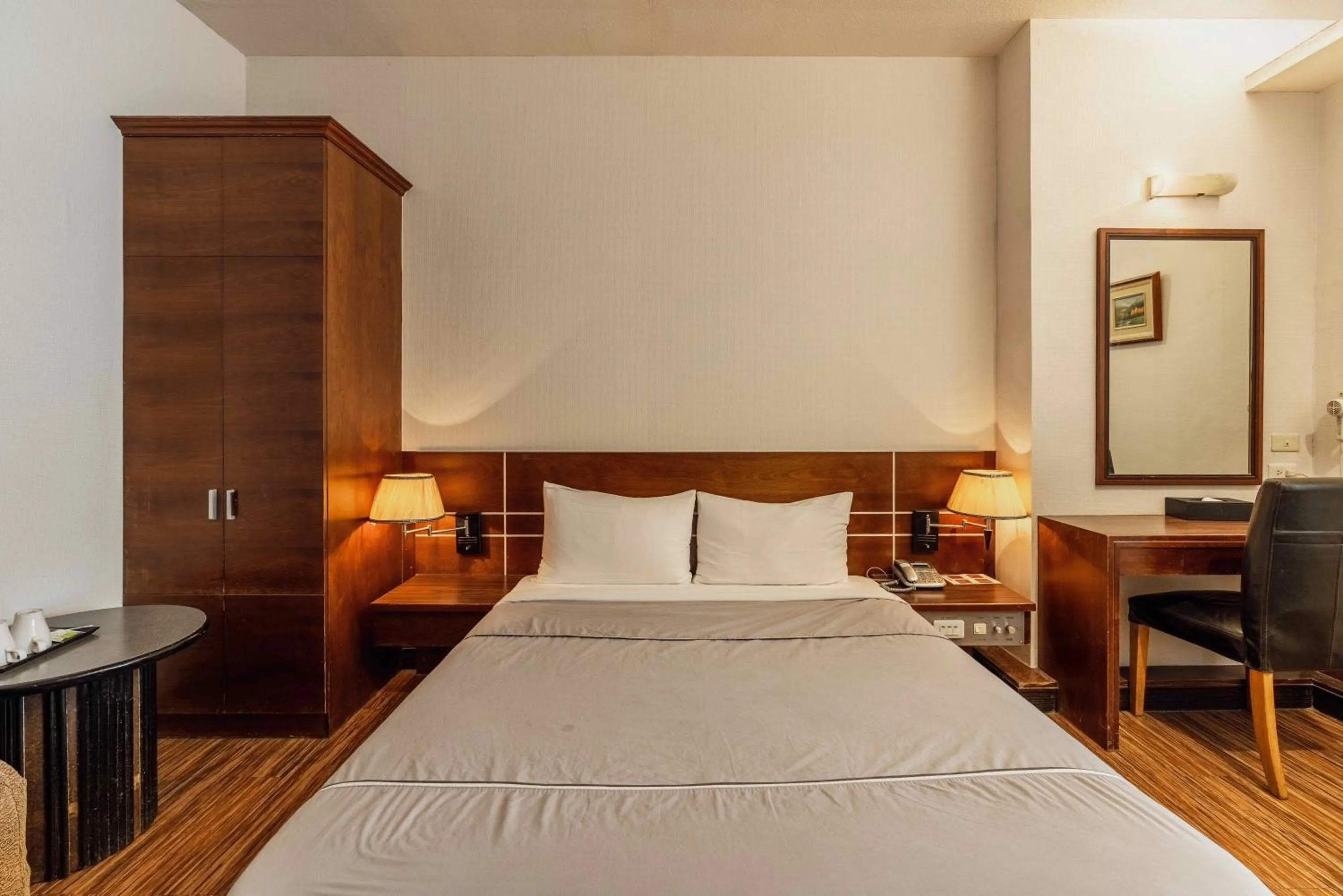 Photo of the whole room, Bed in Hwa Nan Hotel