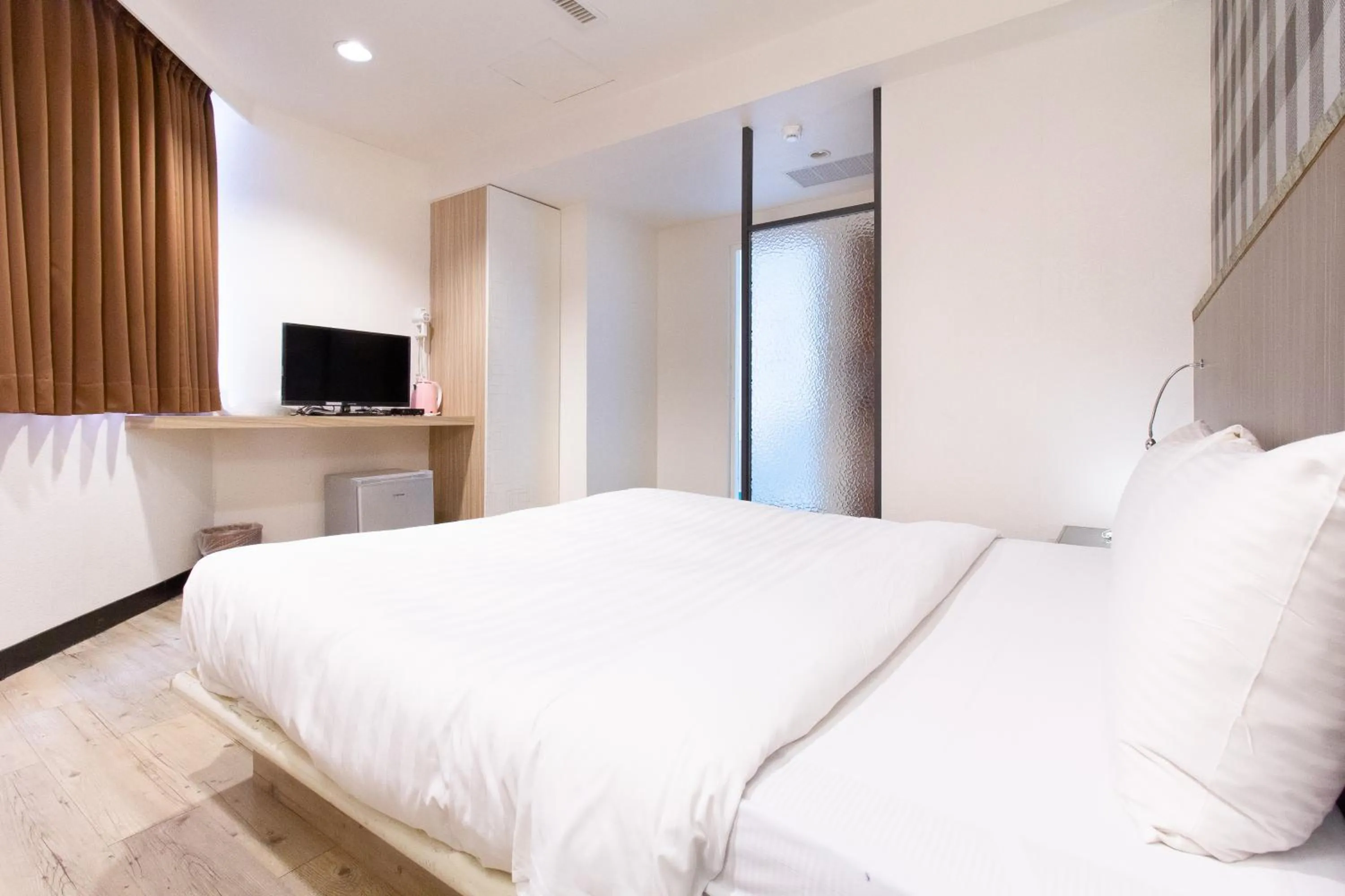 Bed in Hwa Nan Hotel