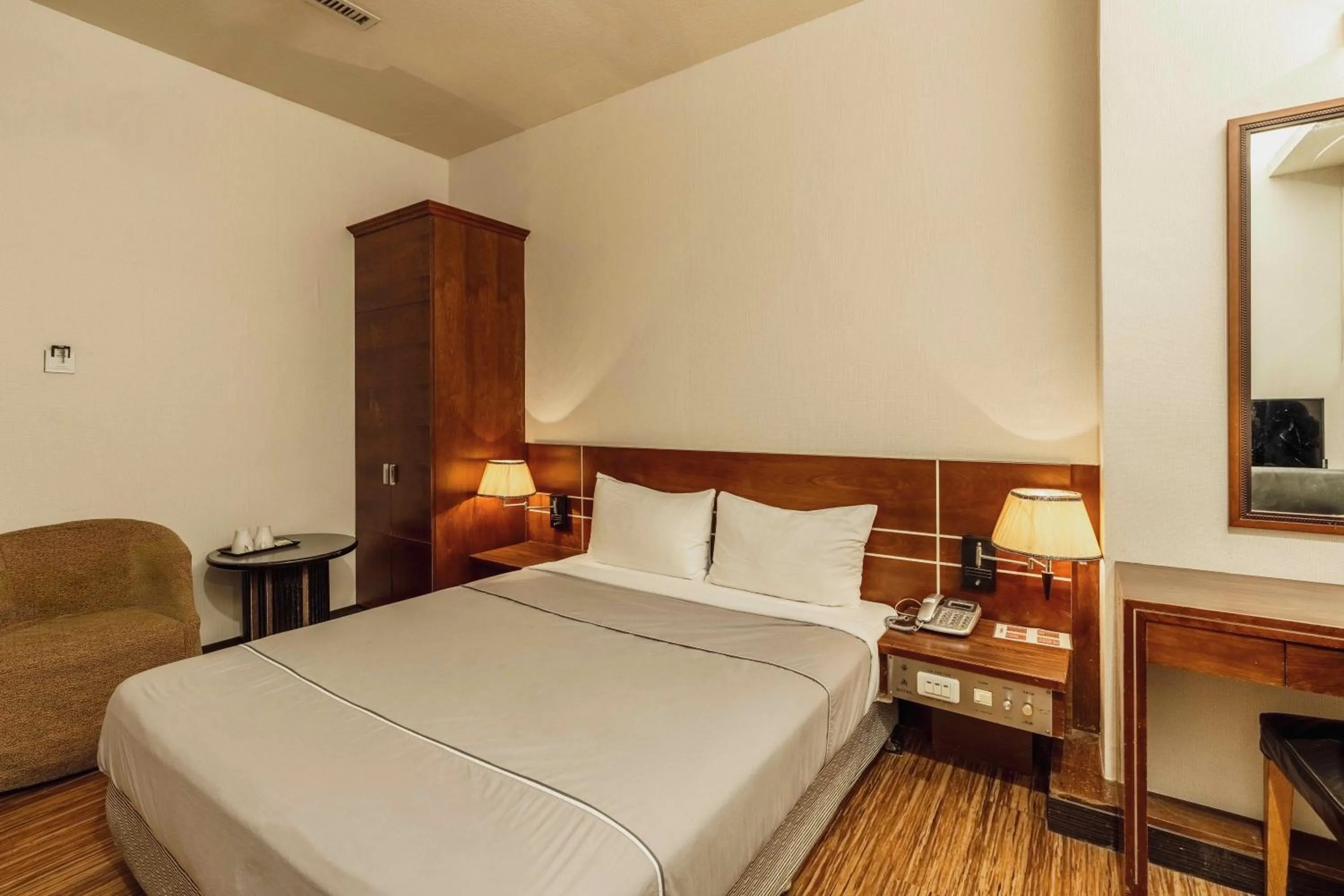 Photo of the whole room, Bed in Hwa Nan Hotel