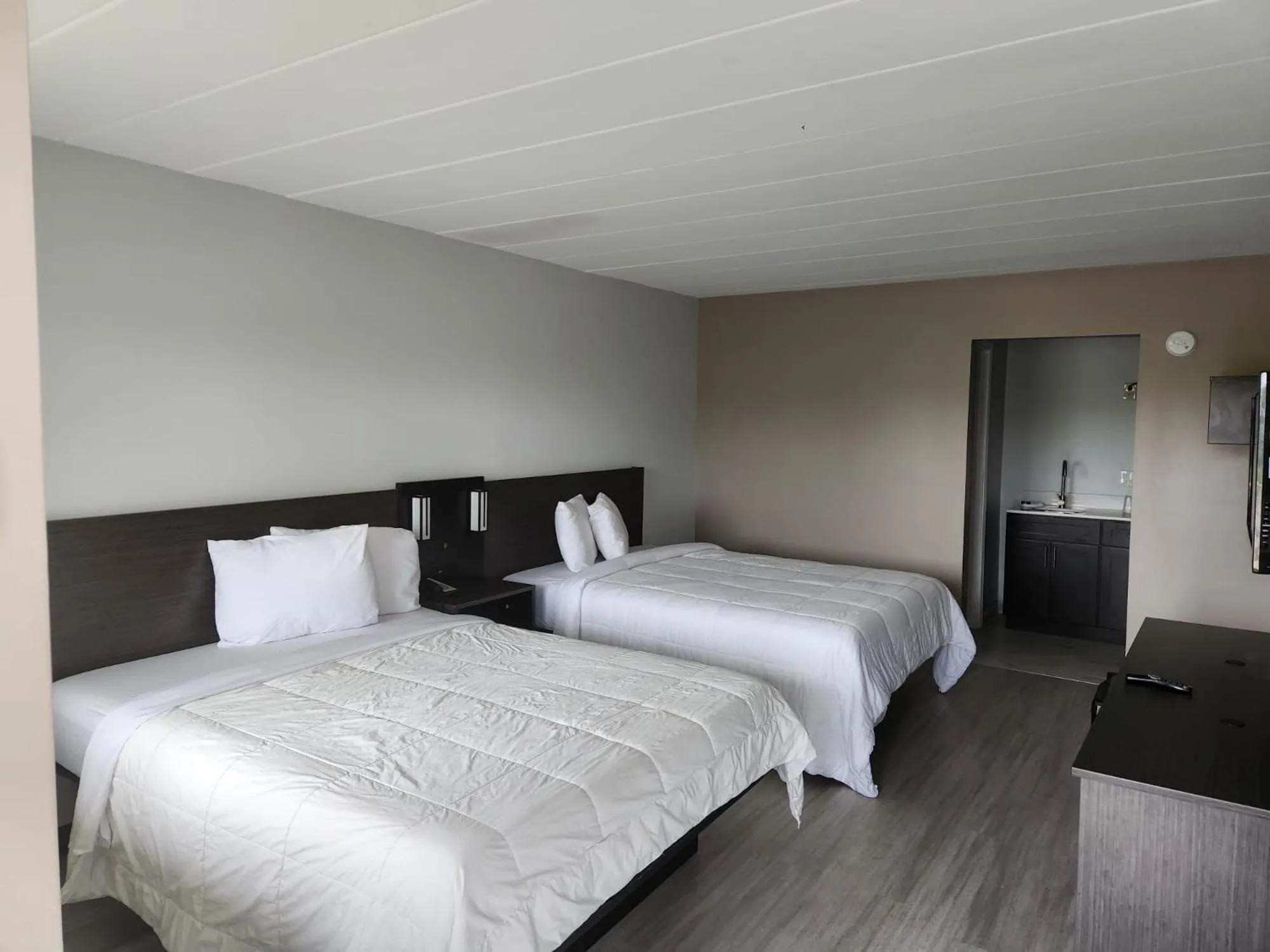 Bed in Royal Inn Hotel