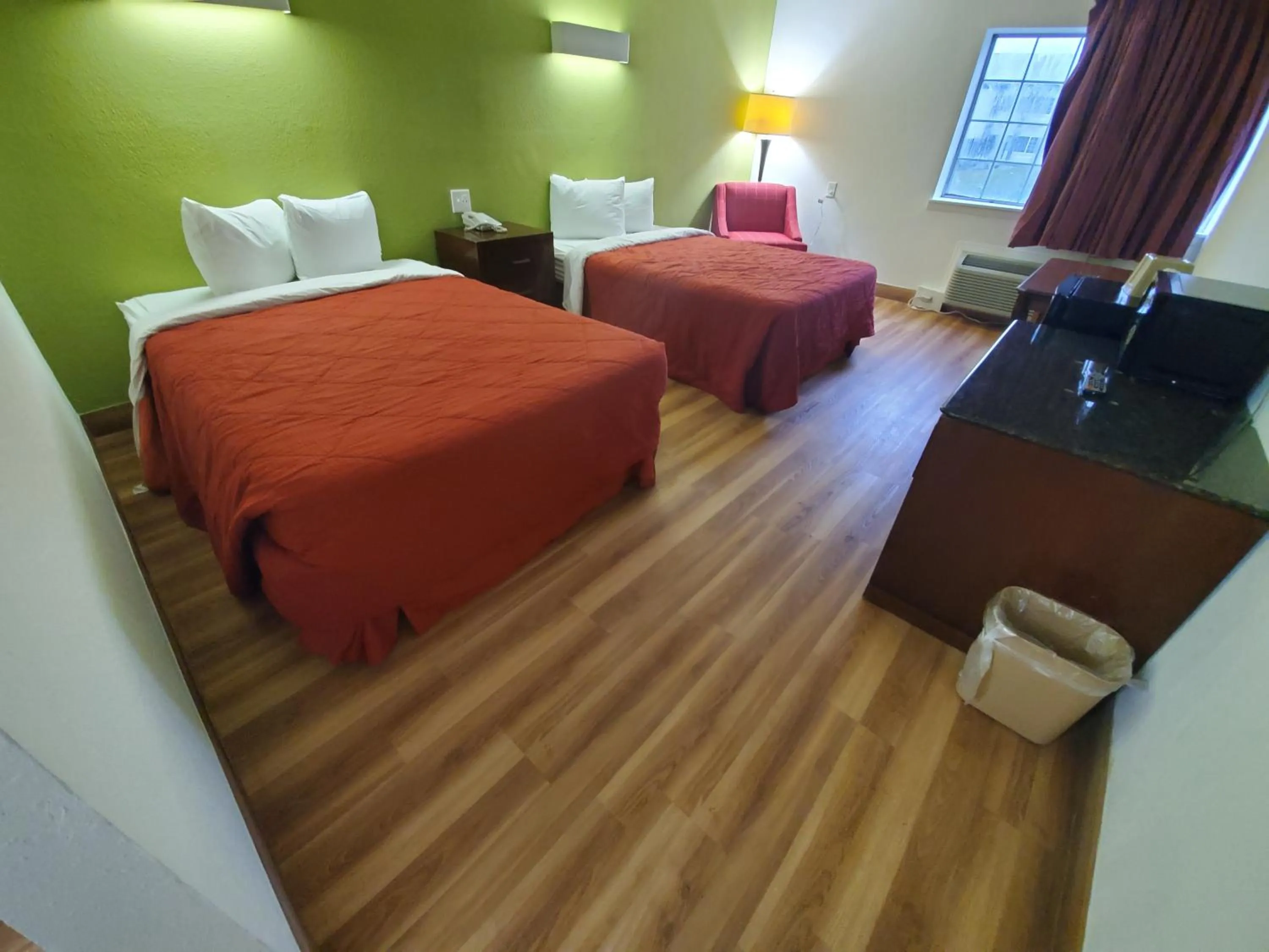 Bed in Royal Inn Hotel