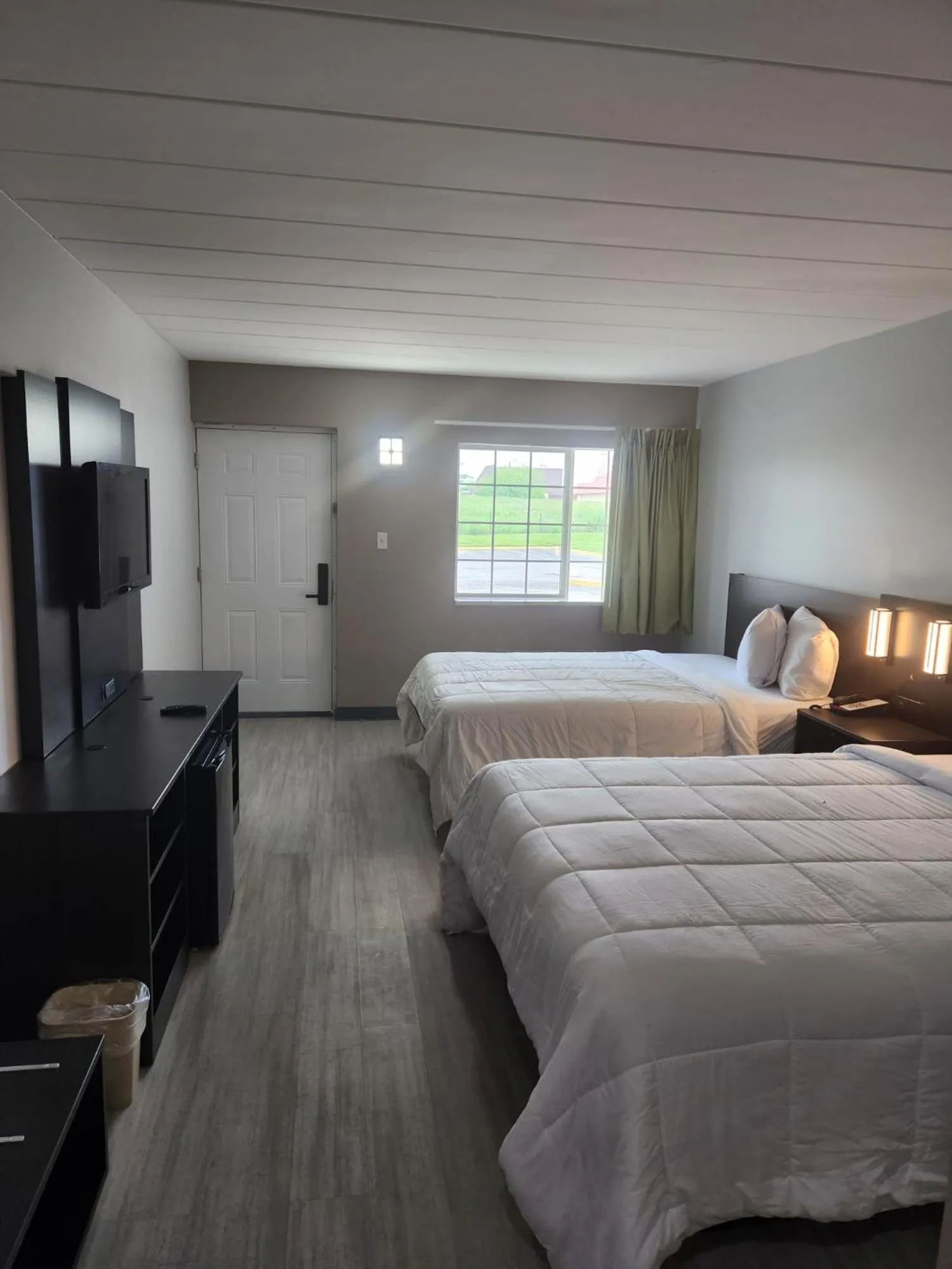 Bed in Royal Inn Hotel