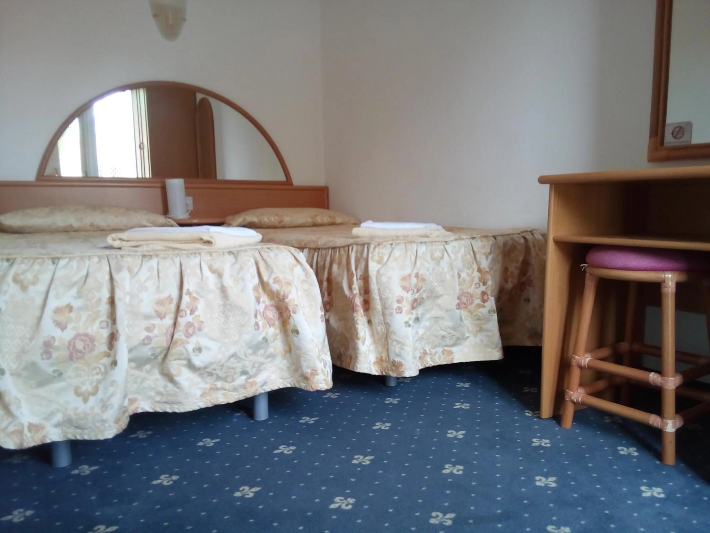 Bed in Hotel Villa Luisa