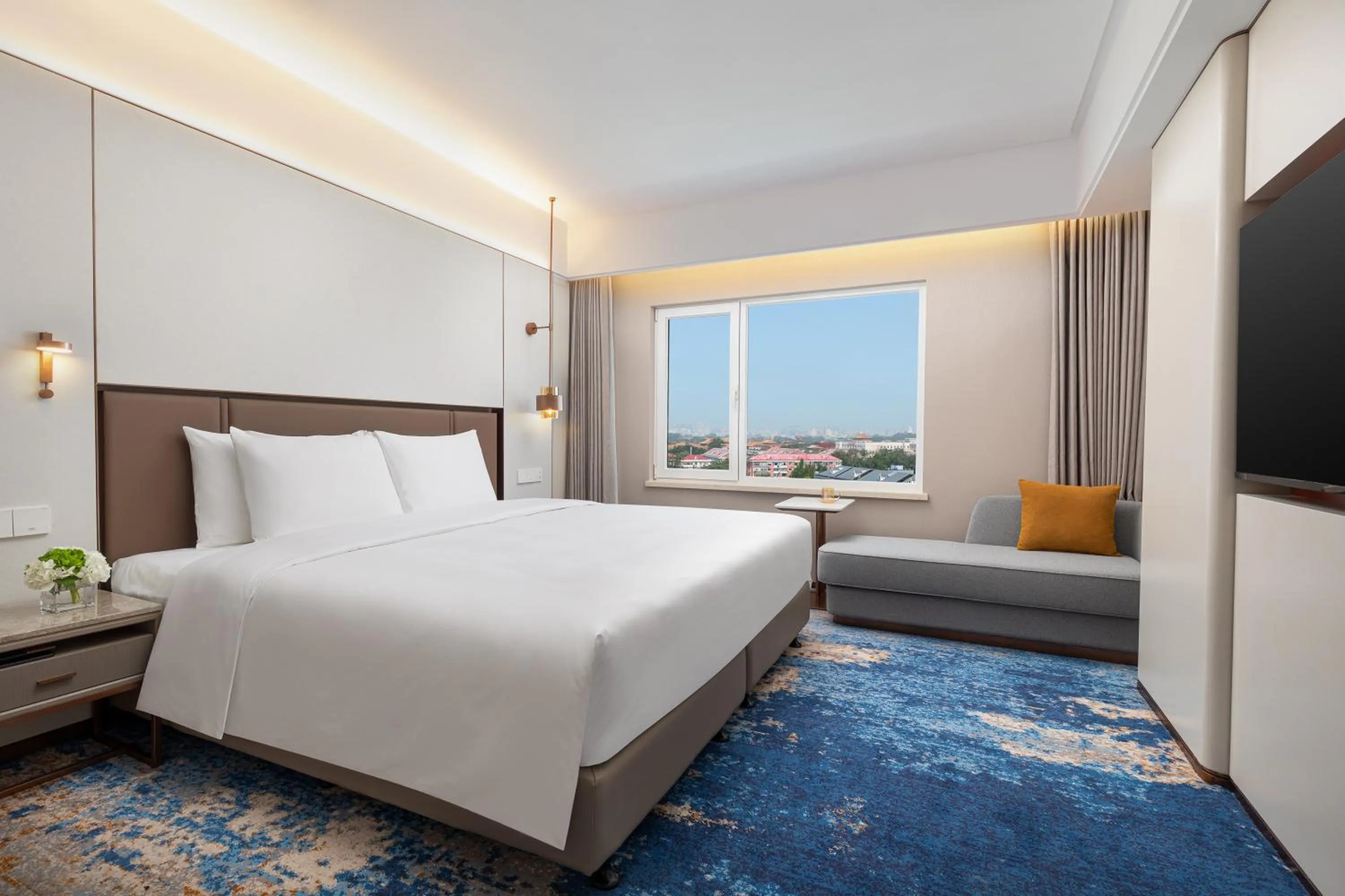 Bed in Sunworld Dynasty Hotel Beijing Wangfujing