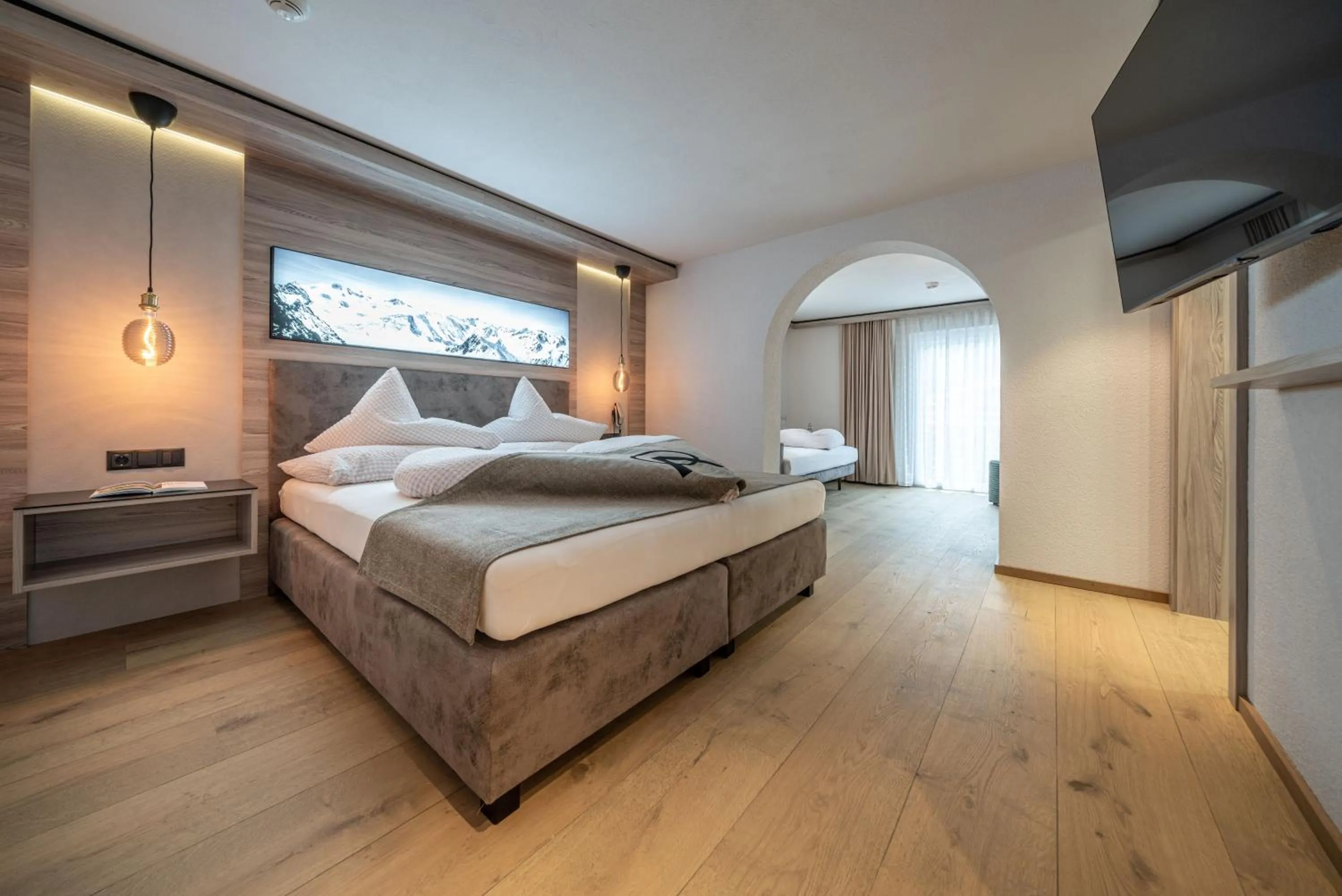 Photo of the whole room, Bed in Genusshotel Alpenblick