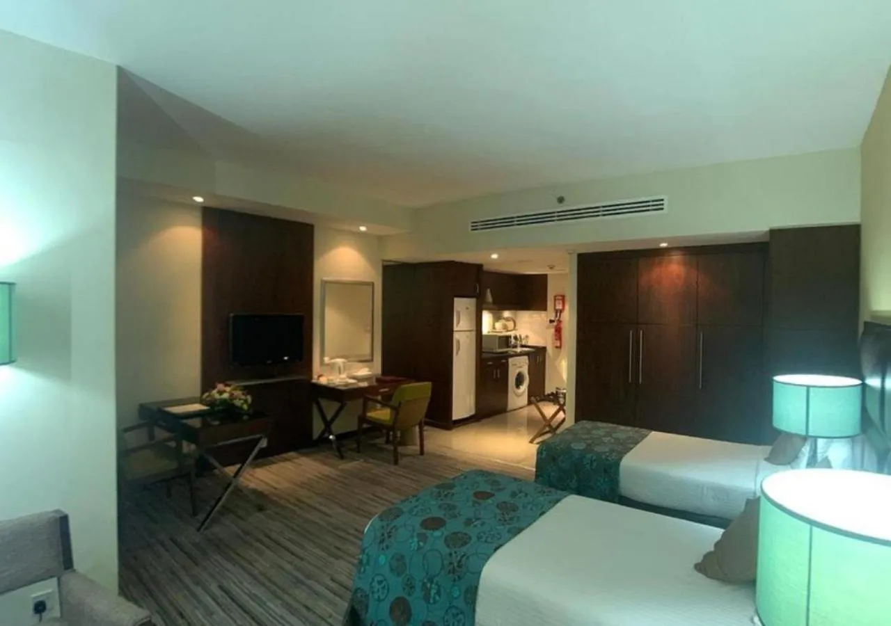 Bed in Phoenix Plaza Hotel Apartments