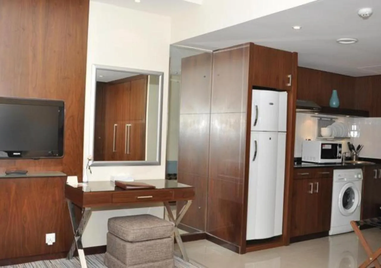 Kitchen or kitchenette in Phoenix Plaza Hotel Apartments