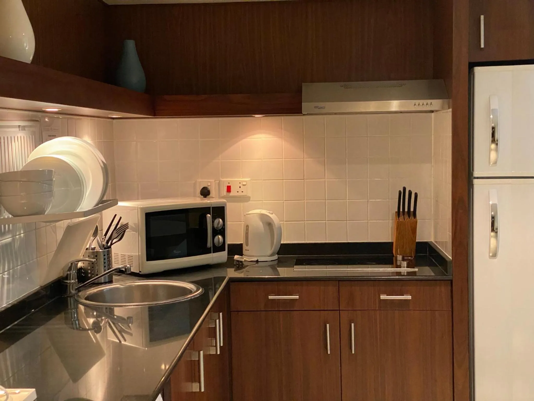 Kitchen or kitchenette in Phoenix Plaza Hotel Apartments